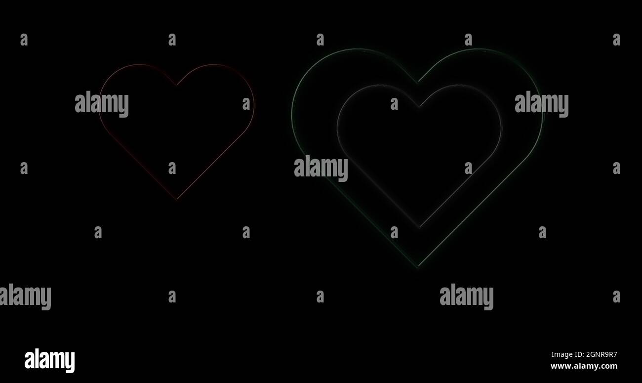Image of red white green neon hearts flashing on black background Stock Photo