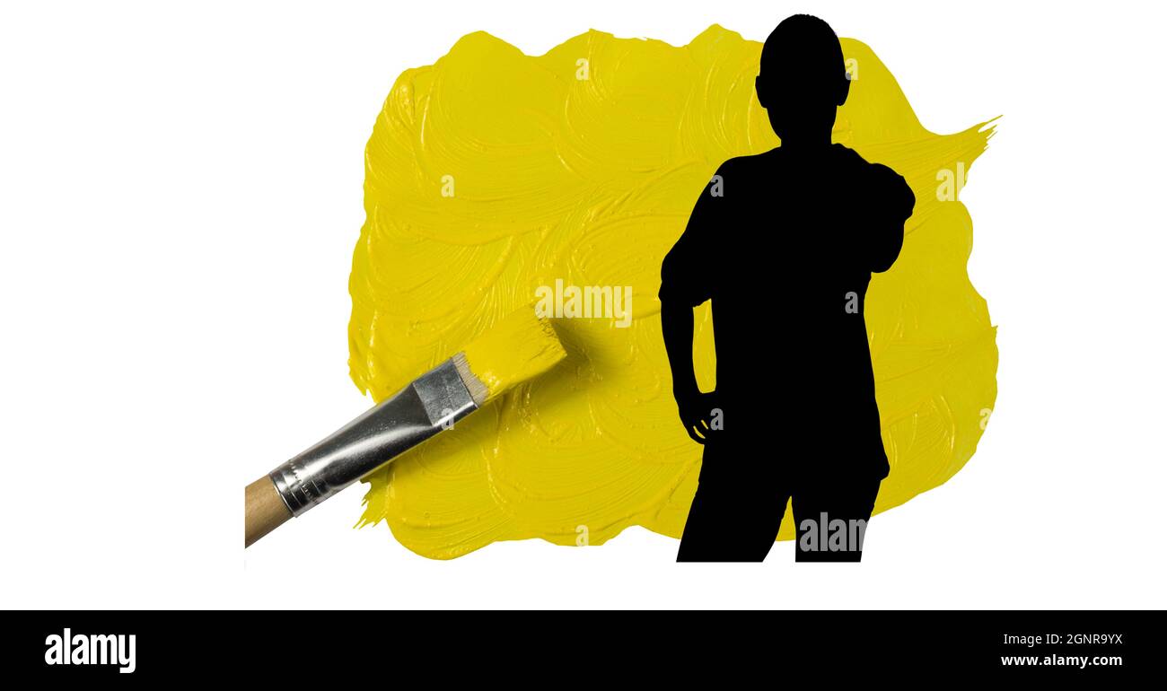 Silhouette of female handball player against yellow paint stain and paint brush on white background Stock Photo