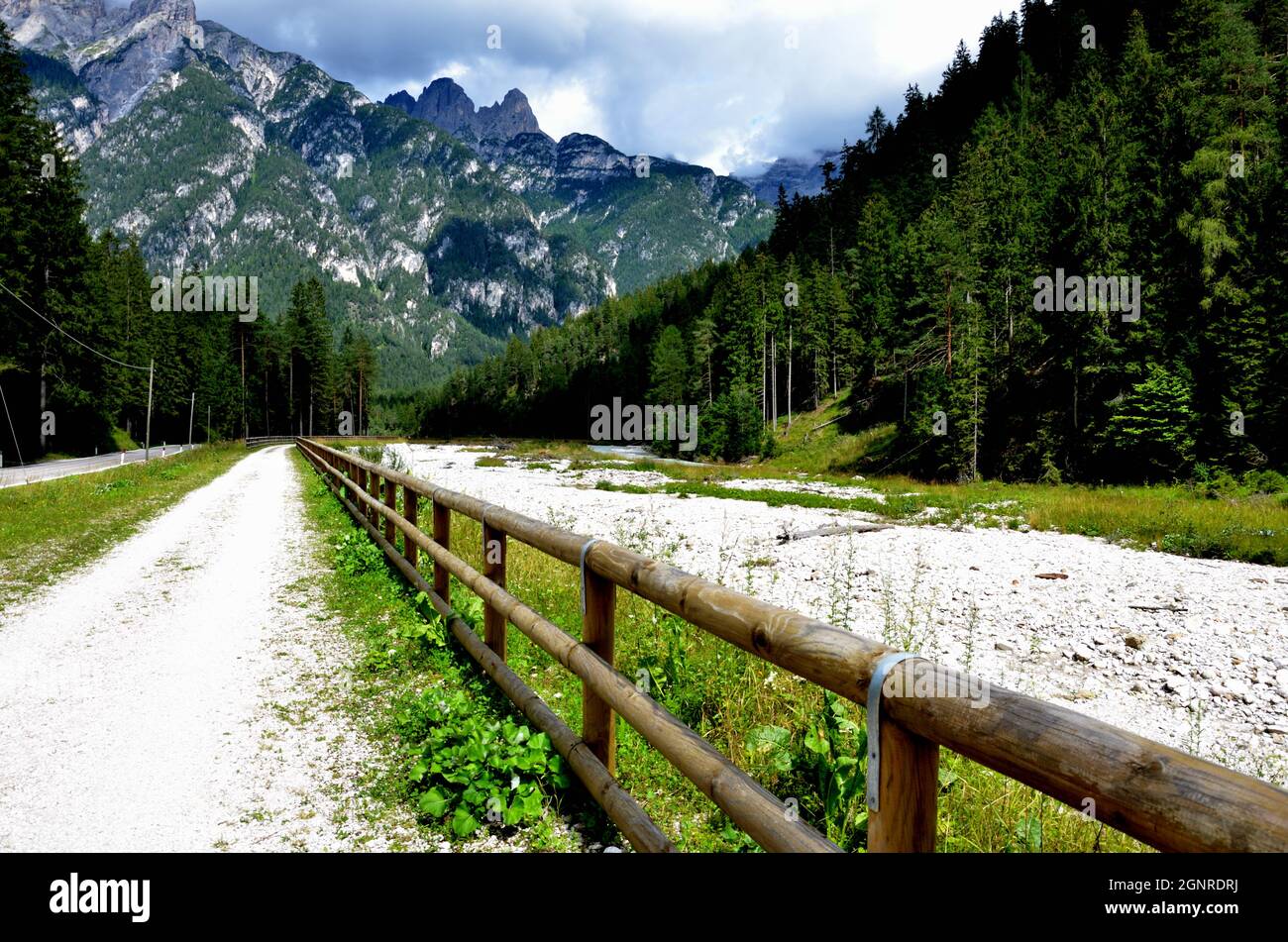 In the Ansiei river valley, the cycle path leads from Misurina to the town of Auronzo Stock Photo
