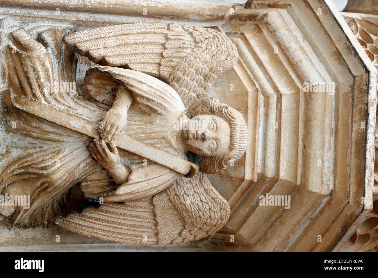 Batalha Monastery. Late Gothic architecture, intermingled with the Manueline style. Western portal.  Angel. Portugal. Stock Photo
