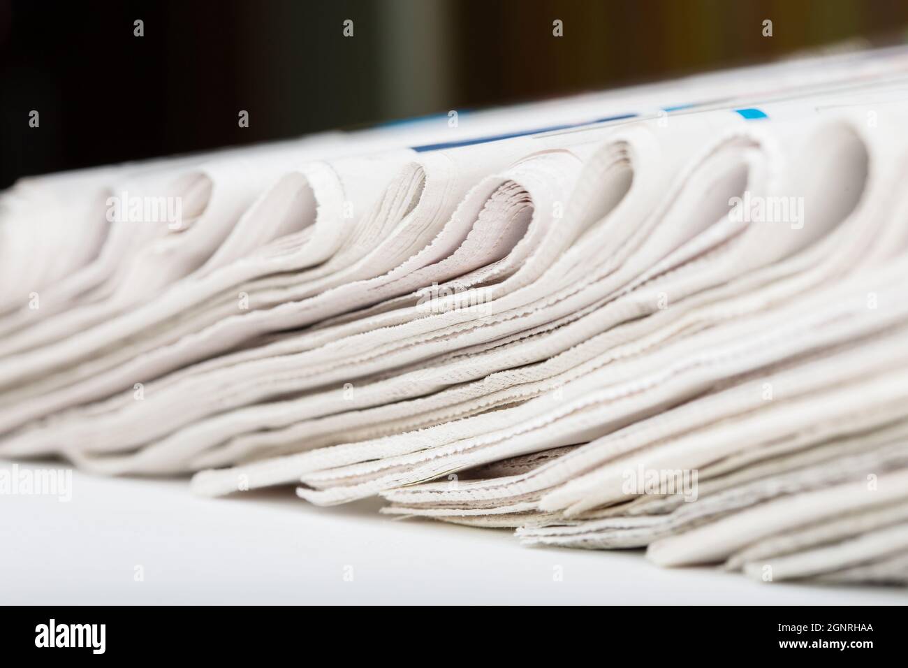 Folded newspapers row Stock Photo Alamy