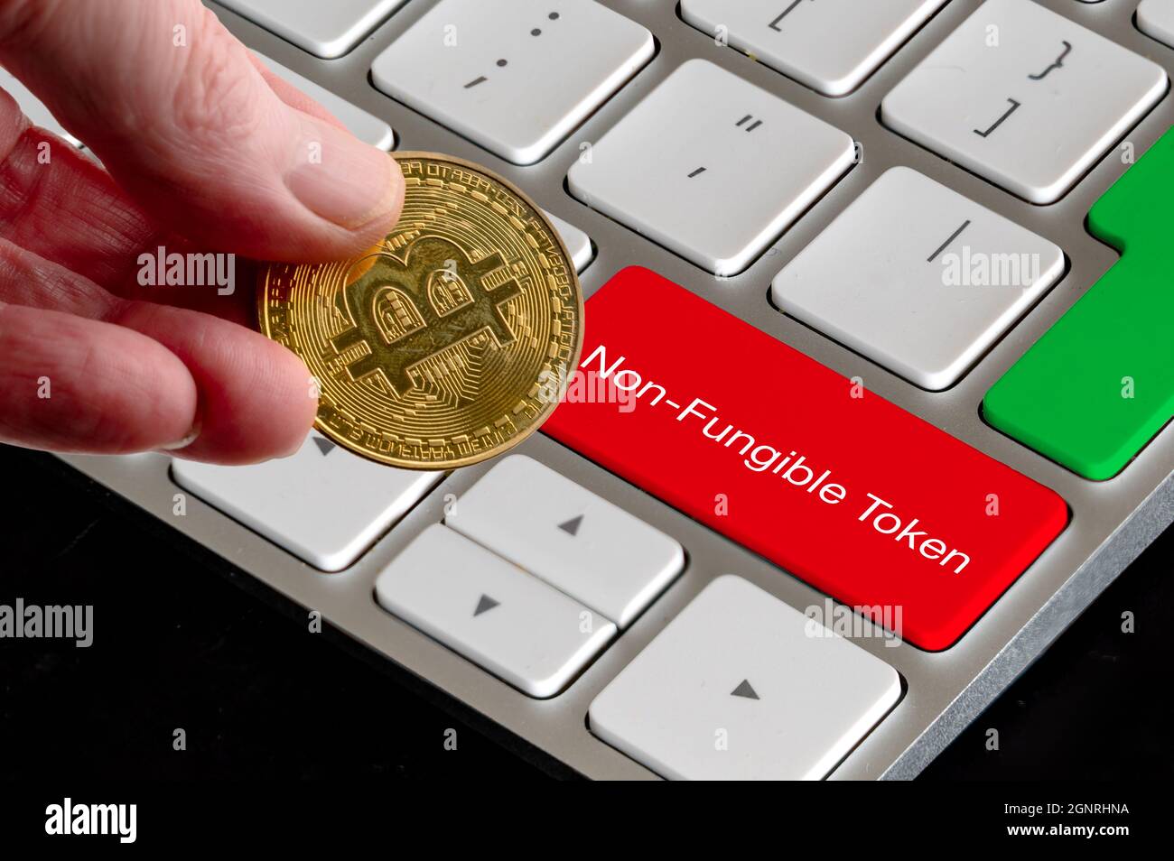 non fungible token concept bit coin and computer keyboard graphic Stock Photo