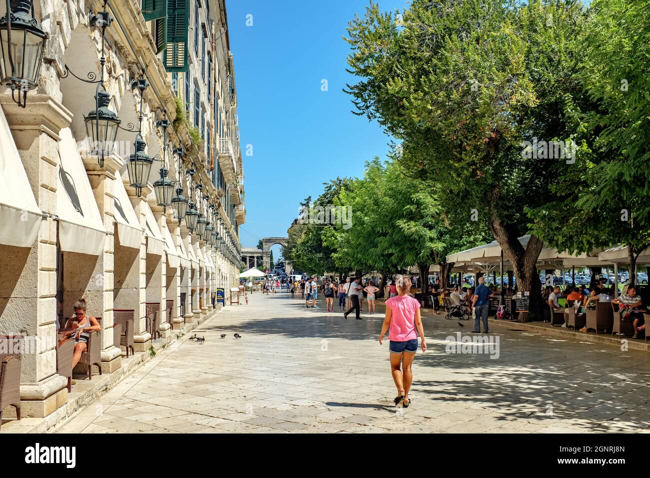 Corfu town, corfu, Greece, August 1 2014 main promenade in corfu town with the cafes and restaurants full of tourists Stock Photo