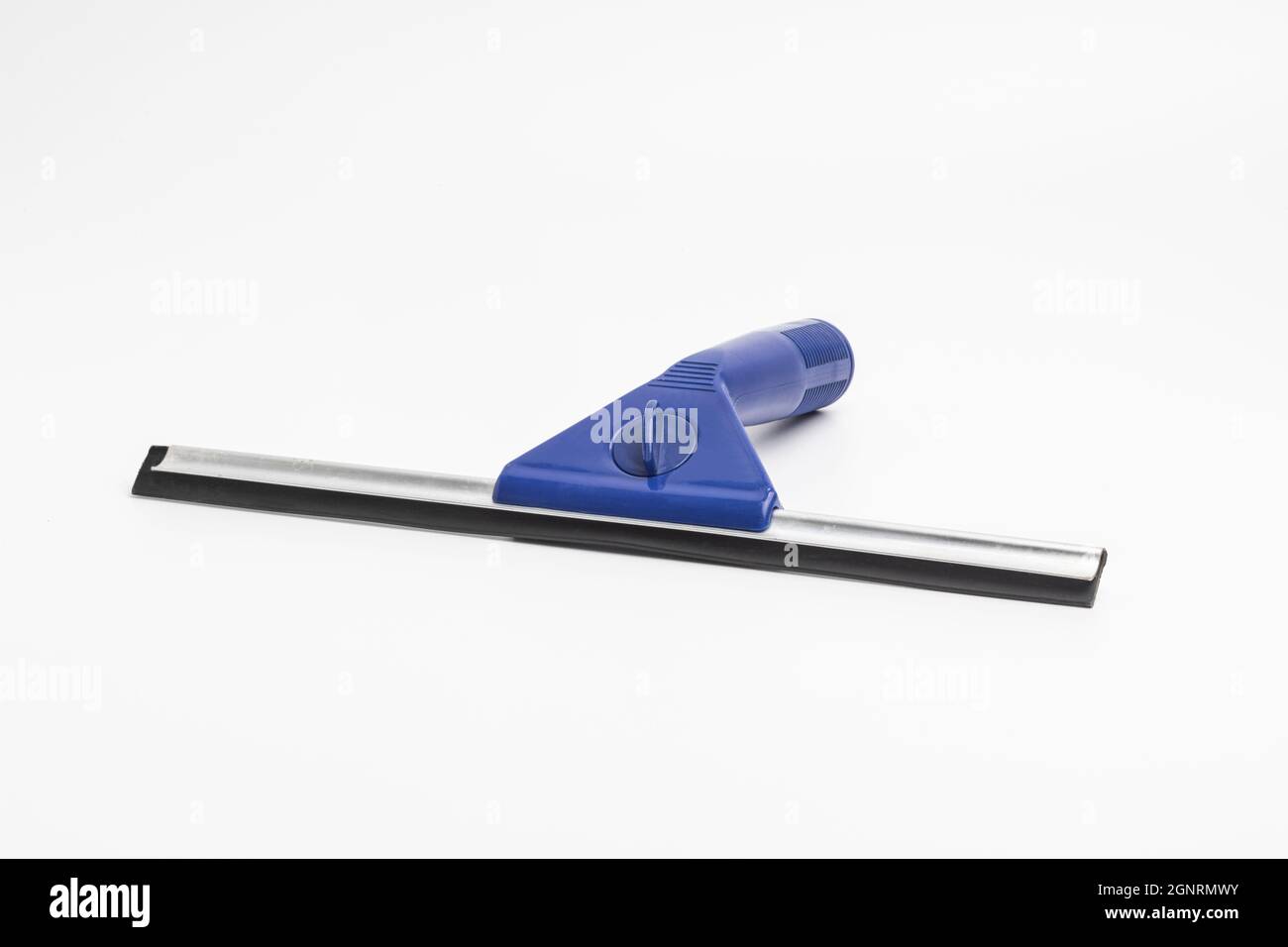 A squeegee with a blue plastic handle Stock Photo