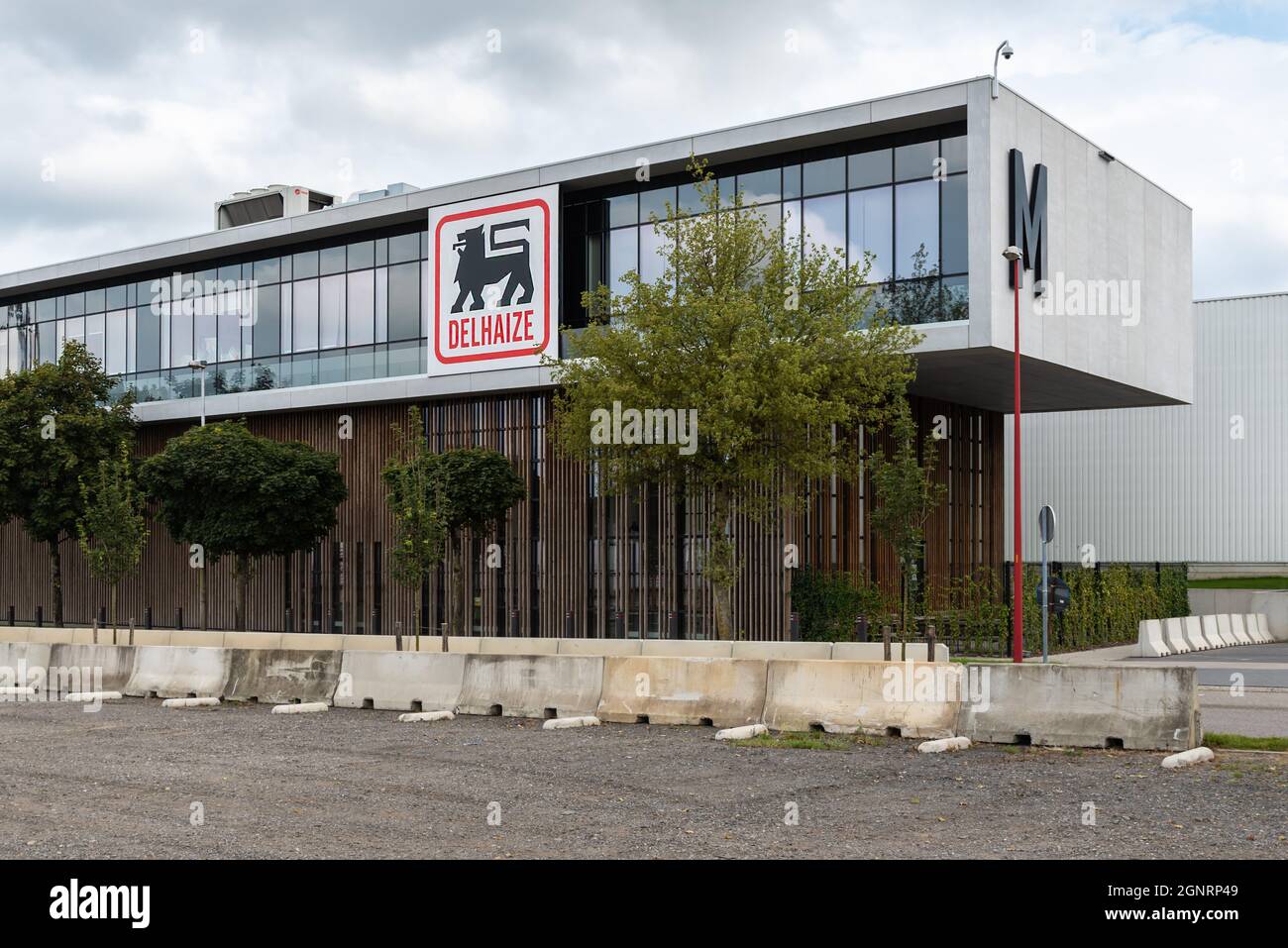 Ghent, Flanders, Belgium - 02 20 2021: The Mediamarkt and Delhaize retail  shops and parking Stock Photo - Alamy