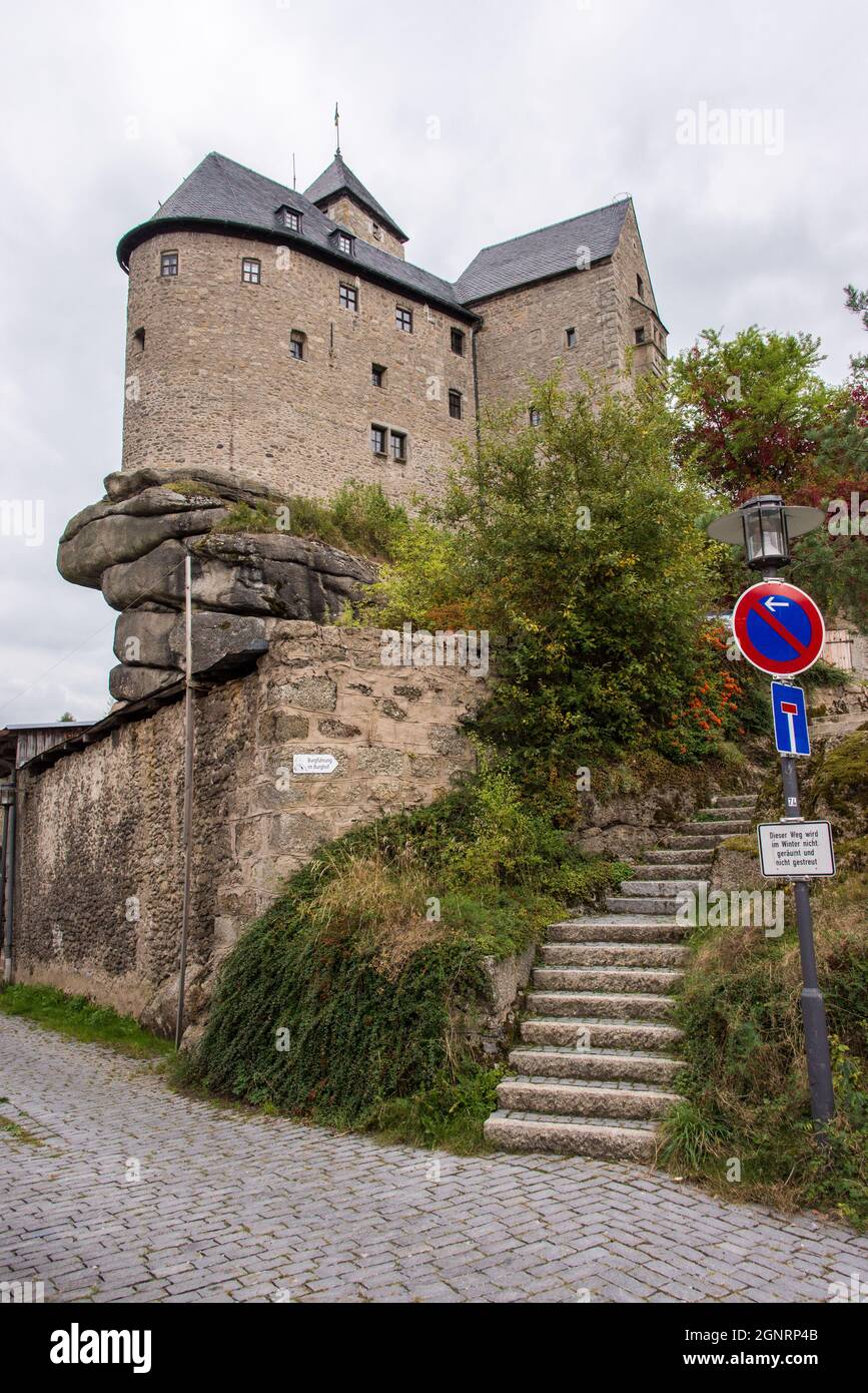 Falkenberg castle stands on granite rocks high above the town and the Waldnaab river. It houses a museum of its history is an attraction in the region. Stock Photo