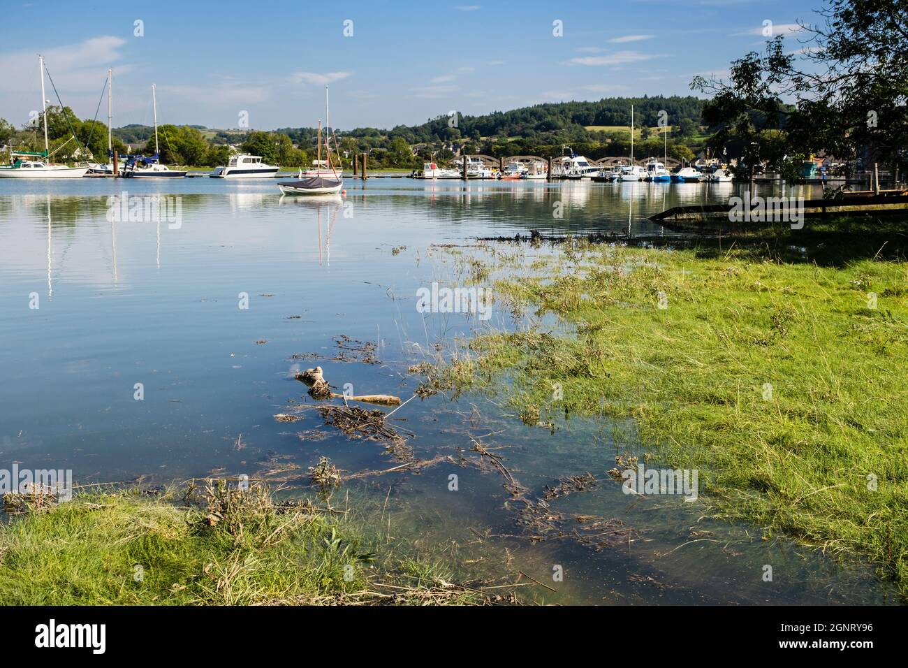 View up the River Dee estuary at high tide with moored boats. Kirkcudbright, Dumfries and Galloway, Scotland, UK, Britain Stock Photo