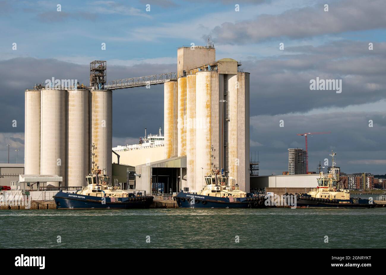 Southampton docks, England, UK. 2021. Grain silos and ocean going tugs in the port of Southampton, UK. Stock Photo