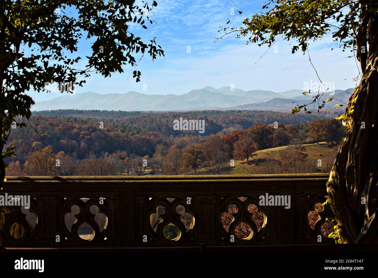 View of the mountains from the Library Terrace at the Biltmore Estate in autumn, the estate is privately owned by the Vanderbilt family in Asheville, North Carolina. The house is the largest private home in America with over 250 rooms. Stock Photo