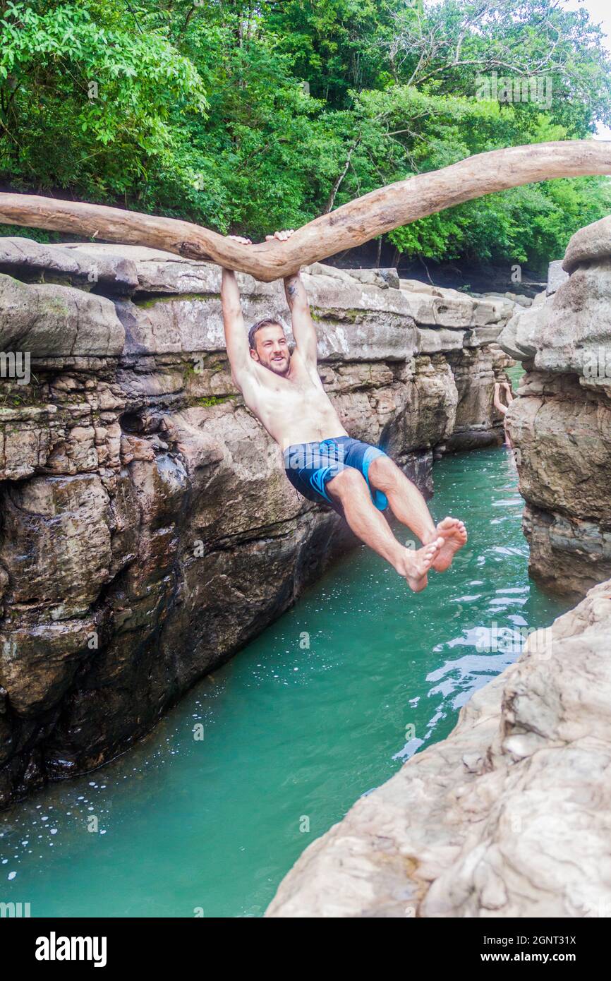 GUALACA, PANAMA - MAY 23, 2016: Tourist enjoys Los Cangilones de Gualaca - mini canyon in Panama Stock Photo