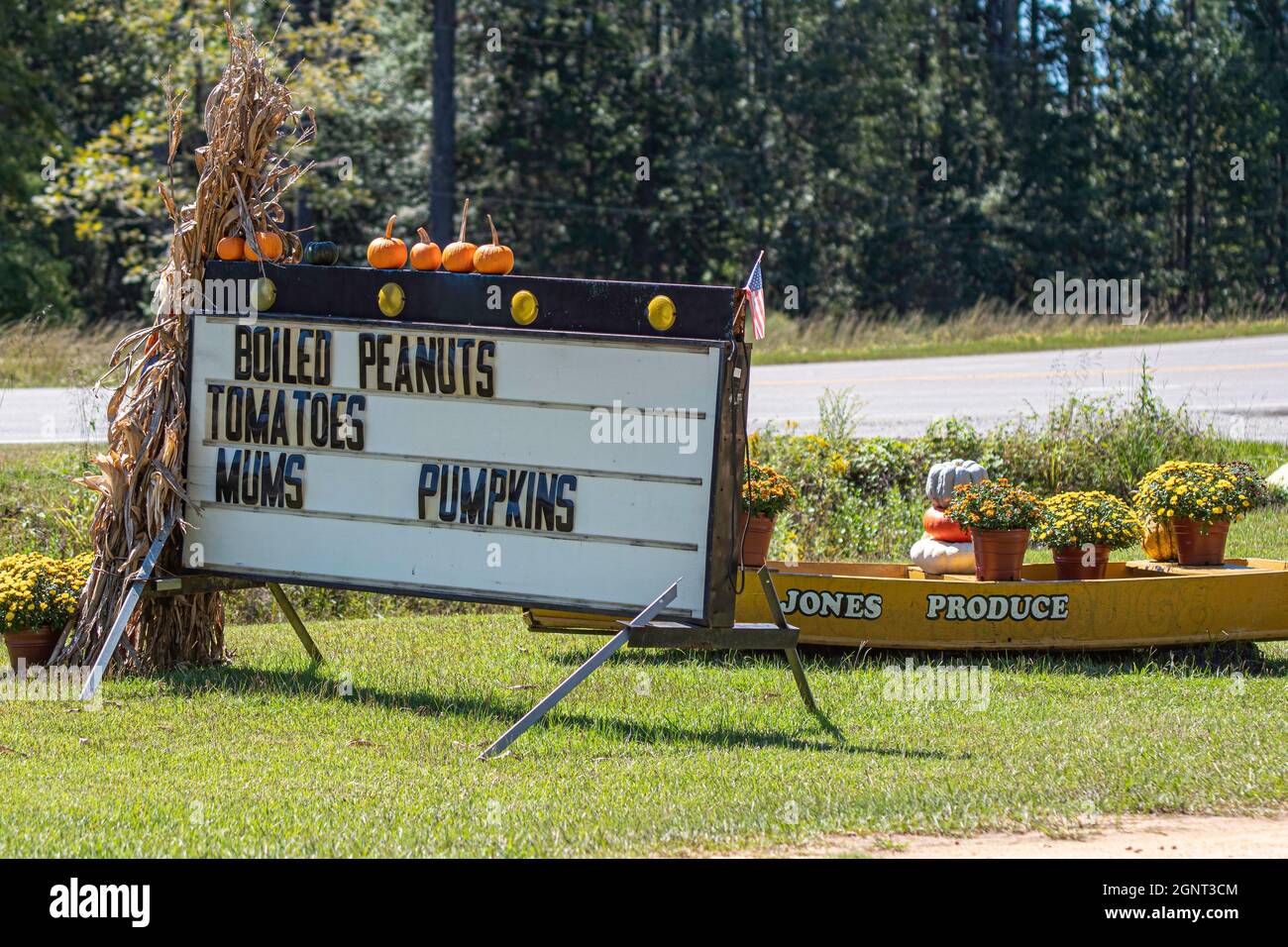 Georgiana, Alabama, USA - Sept. 24, 2021: Roadside sign for Jones Produce stand near the Interstate in Georgiana decked out for autumn with many assor Stock Photo