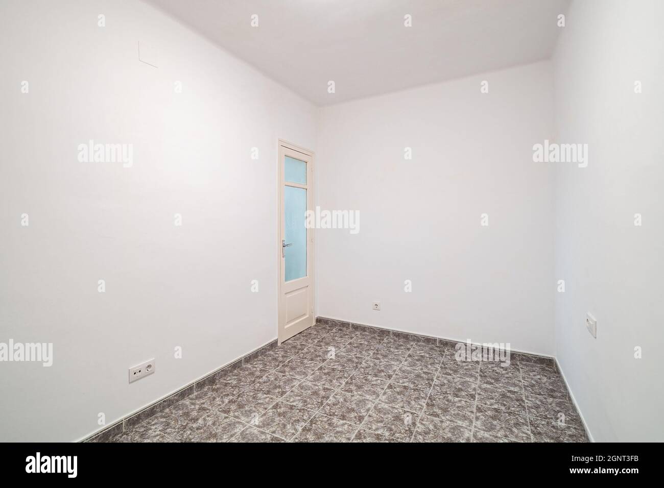 View of Room interior after renovation, unfurnished apartment with white walls ...