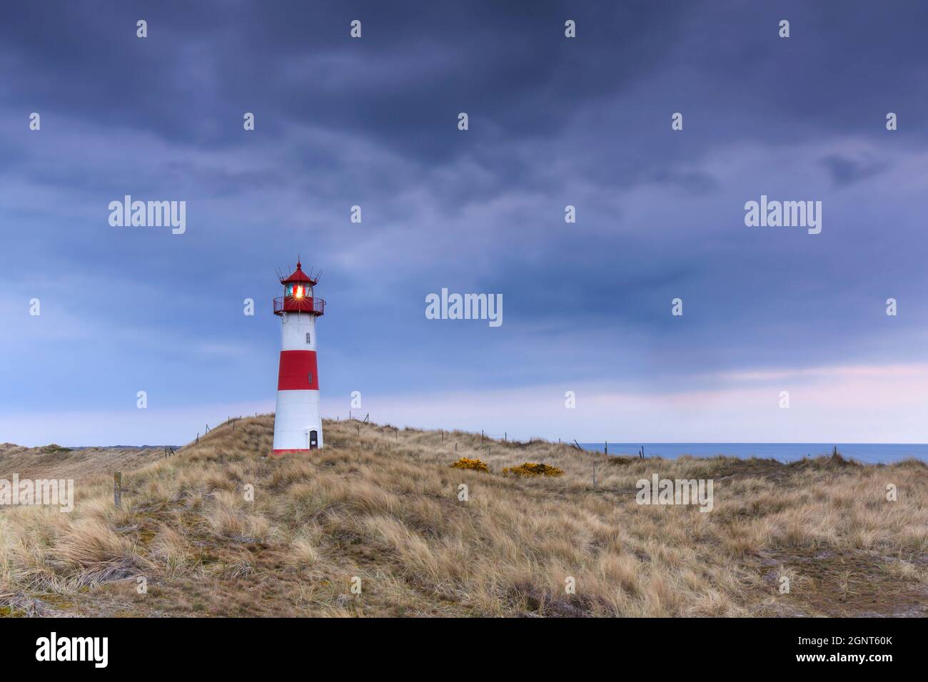 Red and white striped lighthouse List East / List-Ost on the Ellenbogen peninsula on the island Sylt, North Frisia, Schleswig-Holstein, Germany Stock Photo