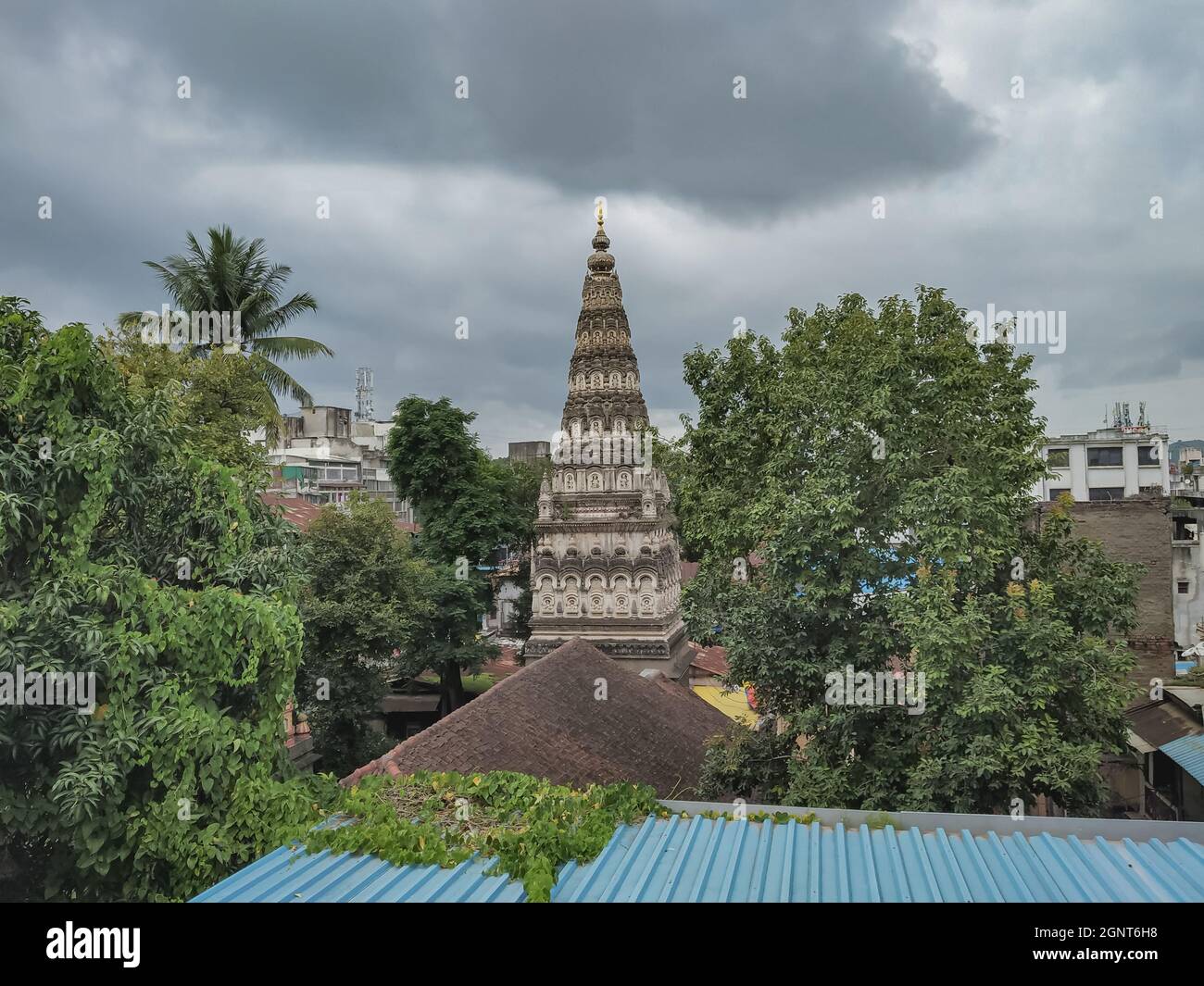 PUNE, INDIA - Aug 28, 2021: PUNE , MAHARASHTRA , INDIA - AUGUST 28, 2021 : Ram Temple in Tulshibaug , Pune. Old temple with trees all around. Stock Photo