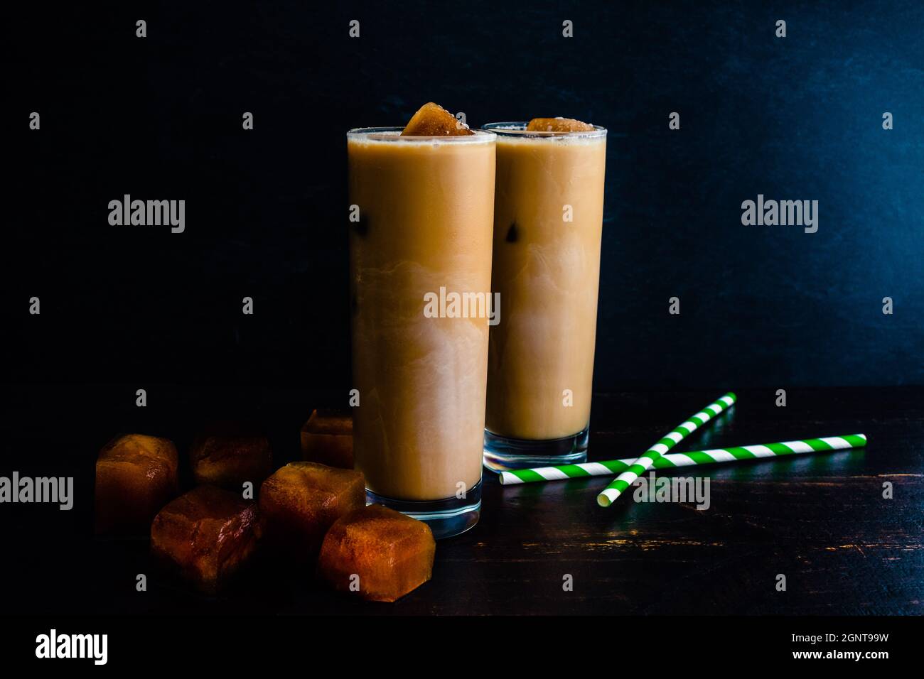 Iced Irish Coffee with Coffee Ice Cubes and Paper Straws Tall glasses