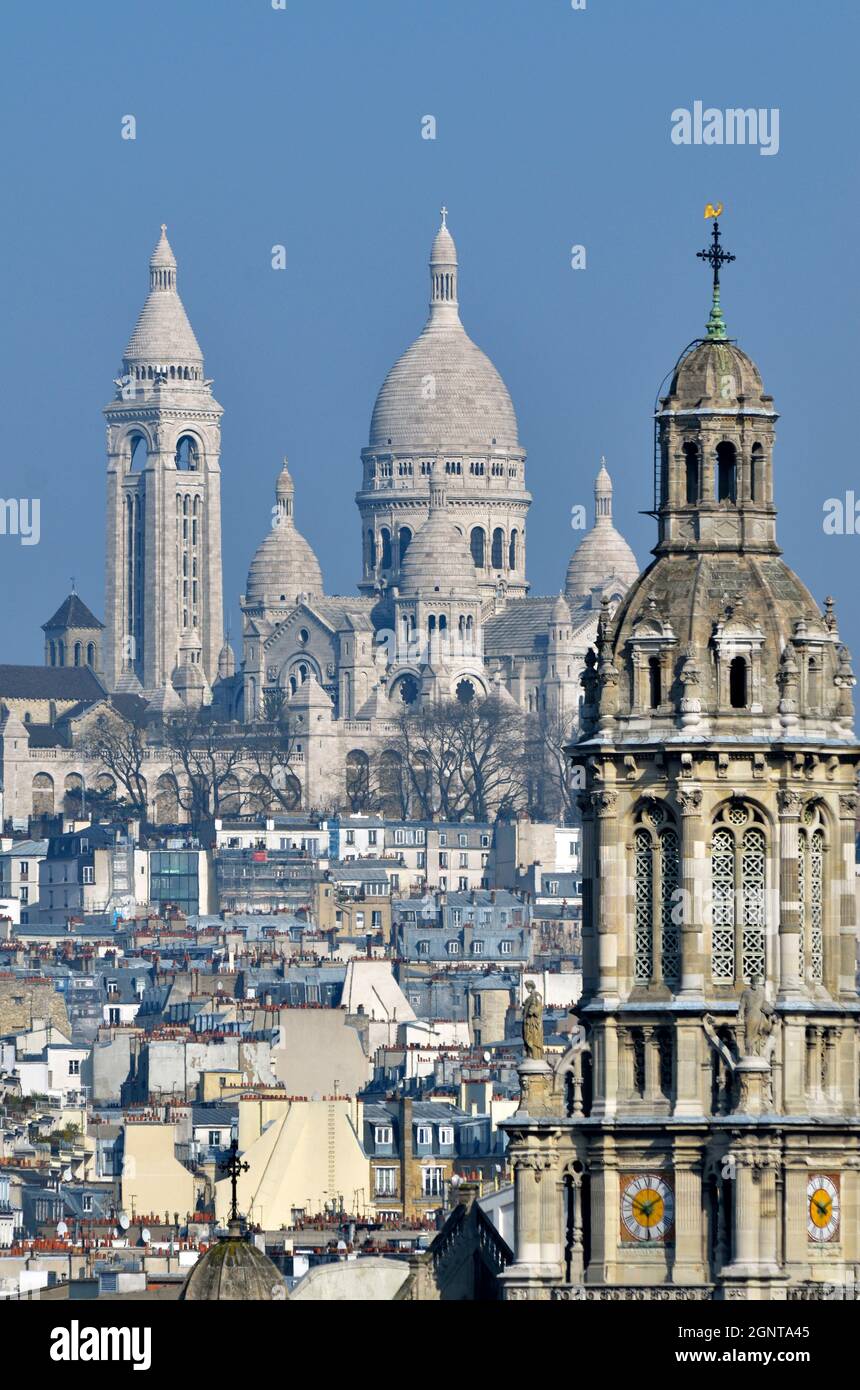 France, Paris (75), la basilique du sacré-Coeur de Montmartre et le clocher de l'église de la Sainte-Trinité // France, Paris, the Basilica of the Sac Stock Photo