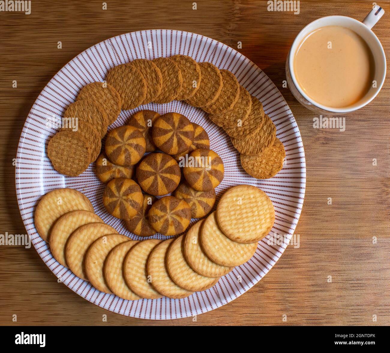 different types of decorated wheat biscuits also called food cracker famous as chai biscuit in