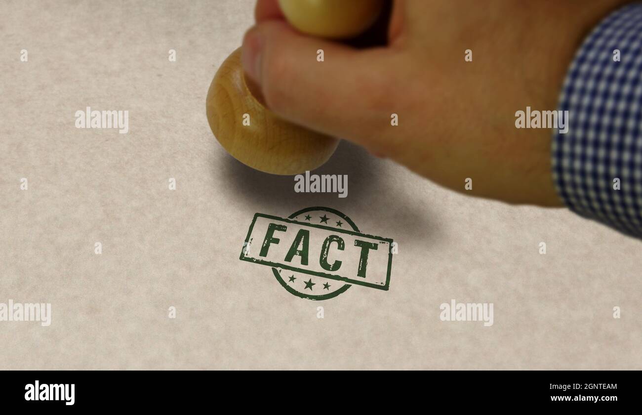 Fact stamp and stamping hand. News, truth and real information concept. Stock Photo