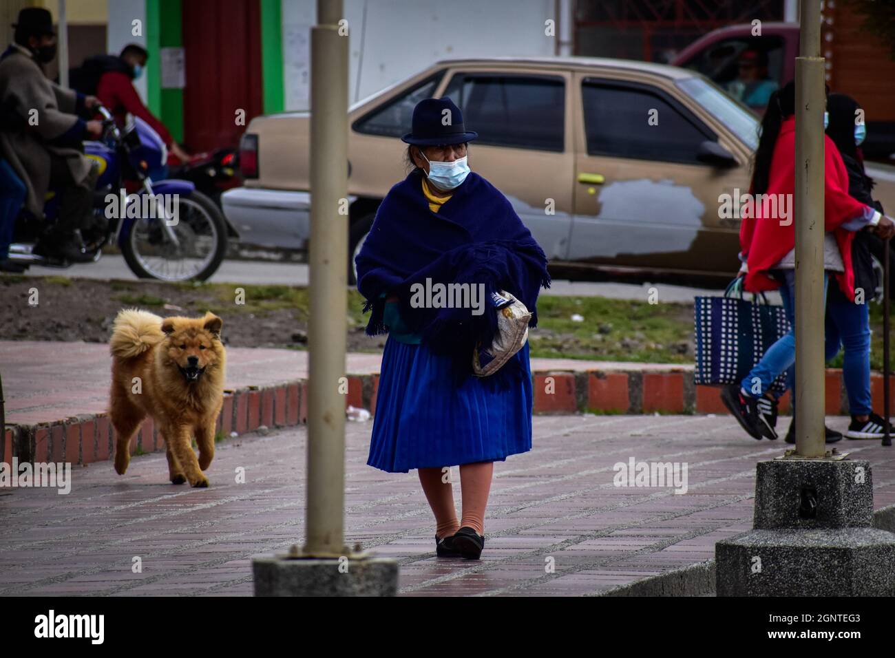 A Misak Indigenous community member wears a protective face mask against COVID-19 in Cumbal - Nariño, Colombia on August 15, 2021. Stock Photo