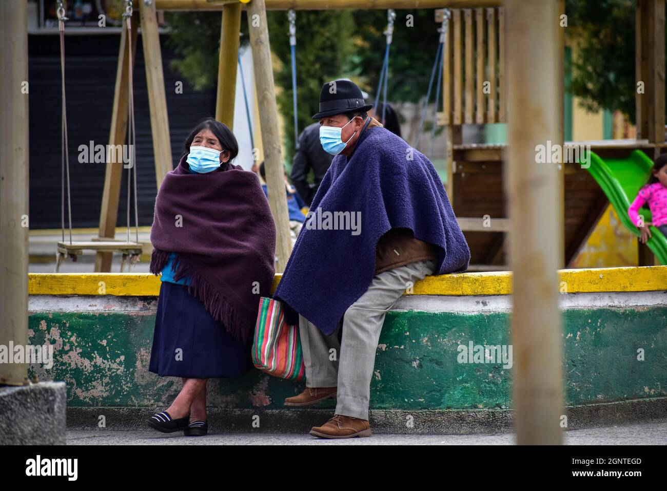 Ealderly citizens wear protective face mask against COVID-19 in Cumbal - Nariño, Colombia on August 15, 2021. Stock Photo