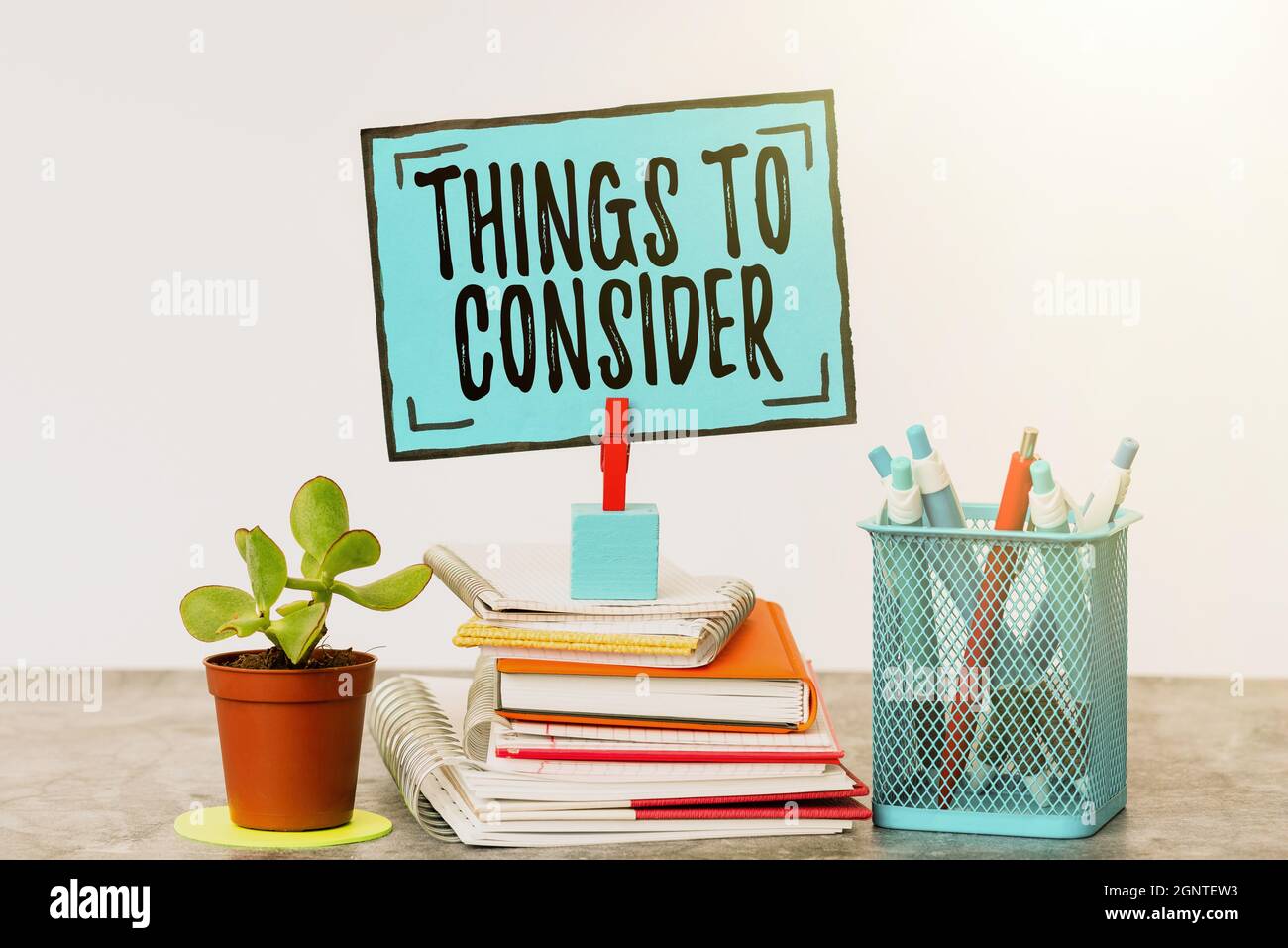 Hand writing sign Things To Consider. Concept meaning think about something carefully in order