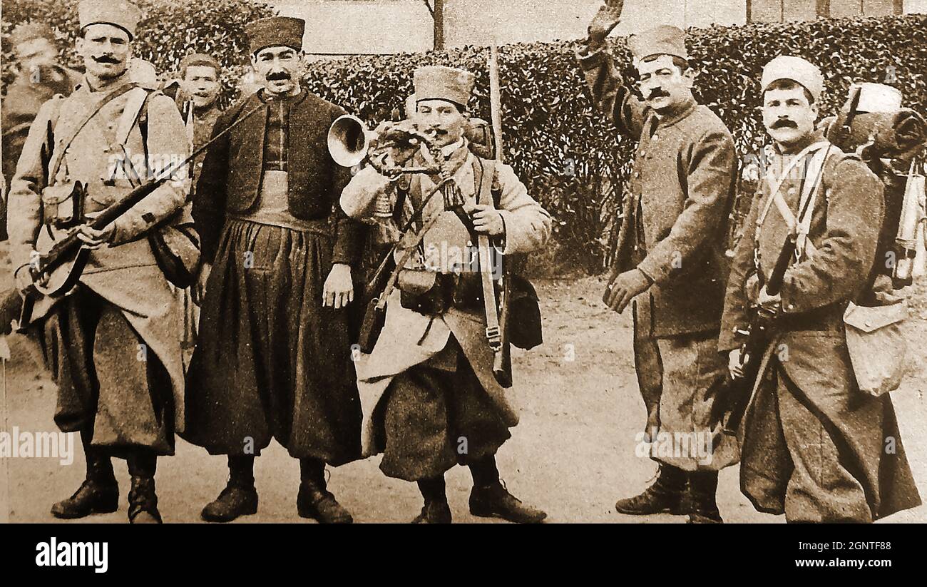 World War I -WWI A group of French Zouaves with their trumpeter   who had been sent to the battle lines in taxis by Gallieni (Joseph Simon Gallieni (1849 –  1916),French minister of War. The Zouaves  light infantry regiments of the French Army who served in WWI (actually from 1830 and 1962) mostly linked to Algeria. The Zouaves, along with the indigenous Tirailleurs Algeriens, were among the most decorated units in the French Army. Stock Photo