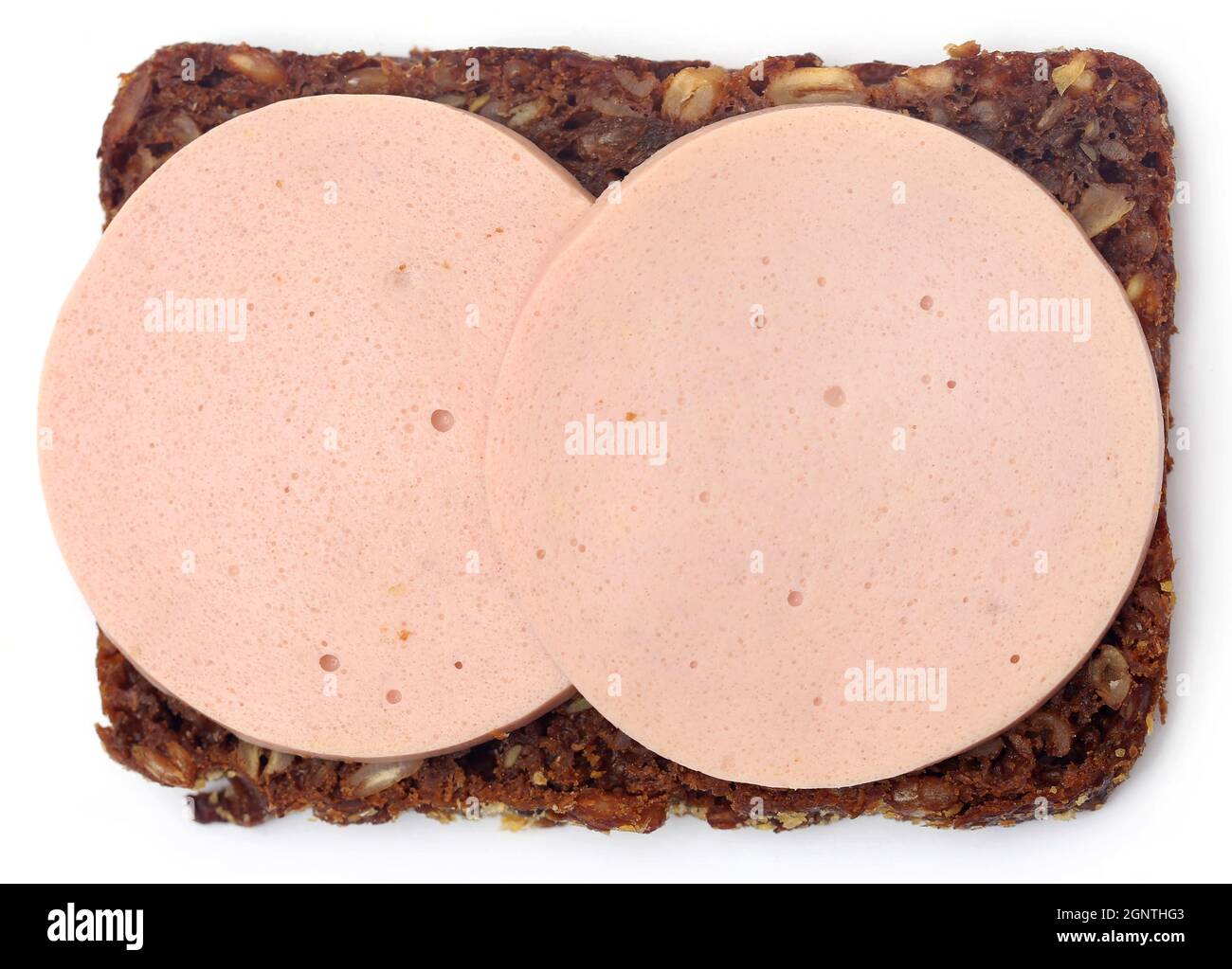 Salami on rye bread over white background Stock Photo Alamy