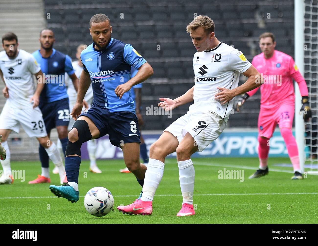 MILTON KEYNES, ENGLAND - SEPTEMBER 25, 2021: Curtis Liam Thompson of Wycombe (L) and Scott Edward Twine of Dons (R) pictured during the 2021/22 SkyBet EFL League One matchweek 9 game between MK Dons FC and Wycombe Wanderers FC at Stadium MK. Copyright: Cosmin Iftode/Picstaff Stock Photo