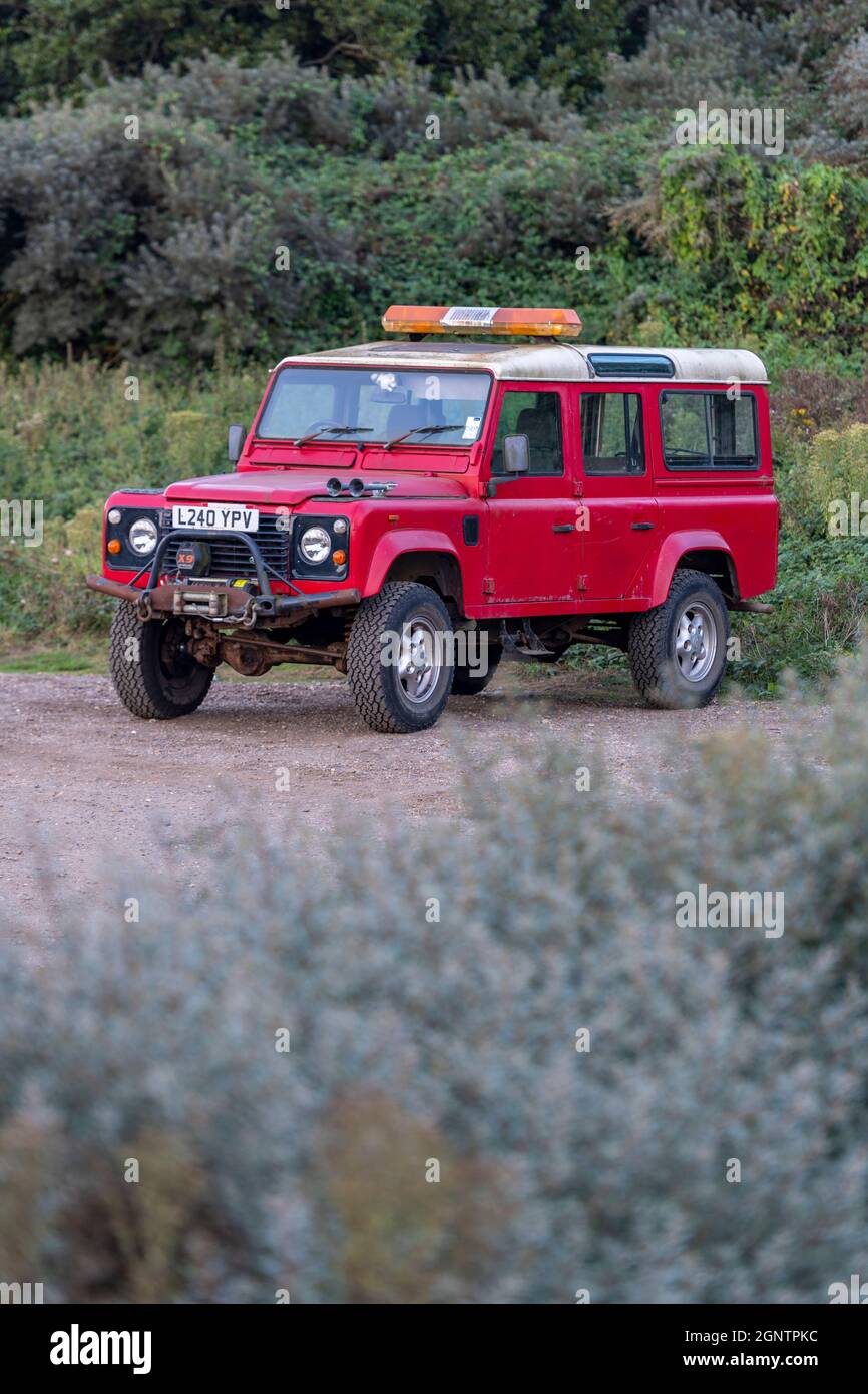 land rover defender long wheel base 110 with superwinch x9 mounted on front bumper with bull bars. British car manufacturers lode lane land rover. Stock Photo