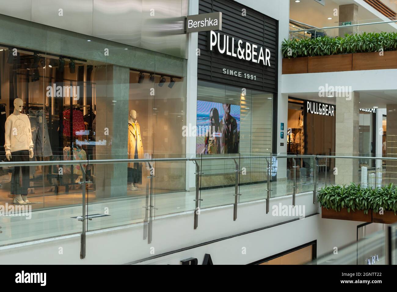 Quito, Pichincha, Ecuador, September 11, 2021. Showcase and sign with  Bershka and Pull & Bear Logo in Quicentro Shopping Center Stock Photo -  Alamy