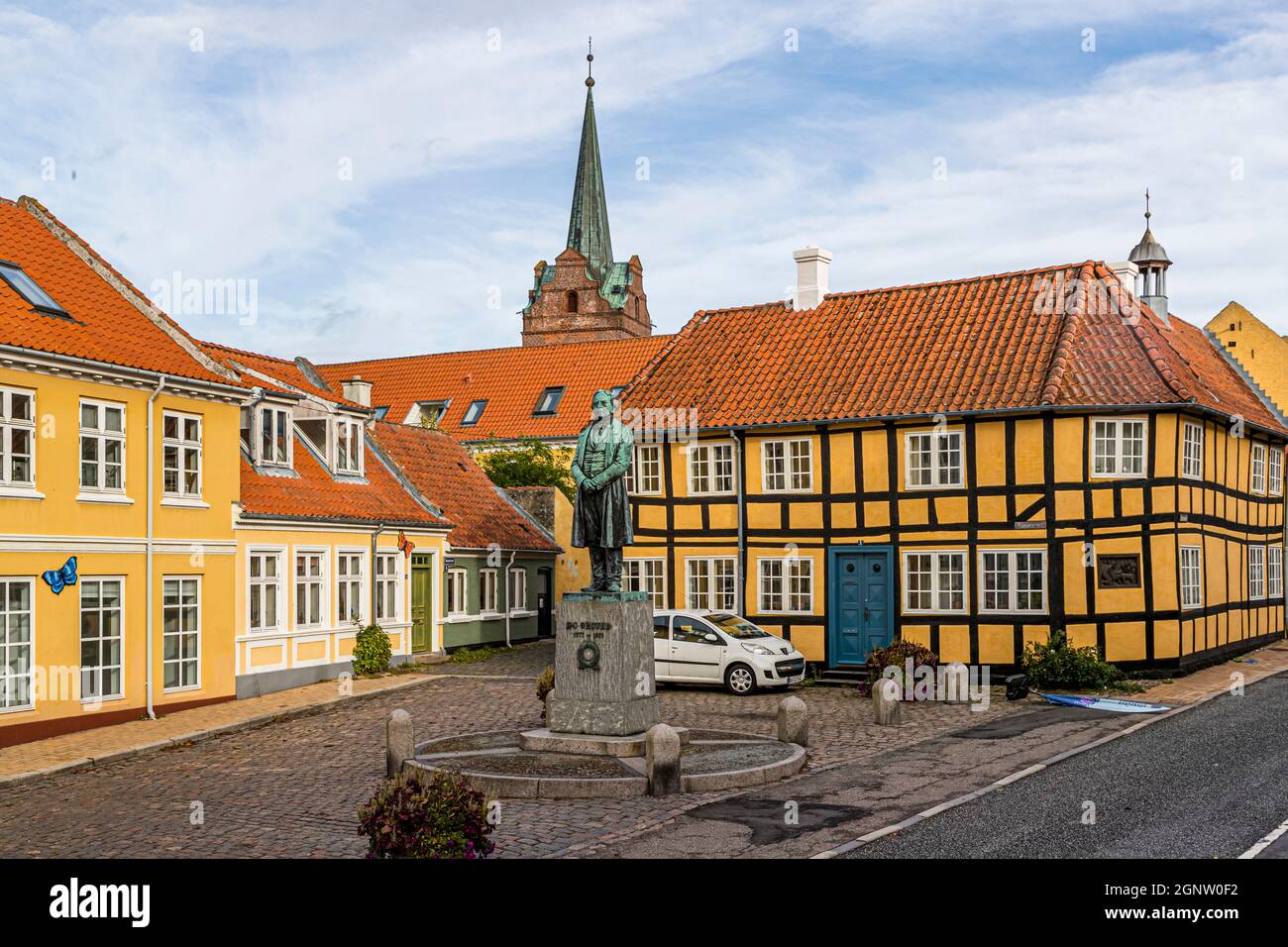 Goose market in Rudkøbing. The statue commemorates the physicist Hans Christian Ørsted. The discoverer of electromagnetism was born in Rudkøbing in 1777 as the son of a pharmacist. Rudkøbing, Langeland, Denmark Stock Photo