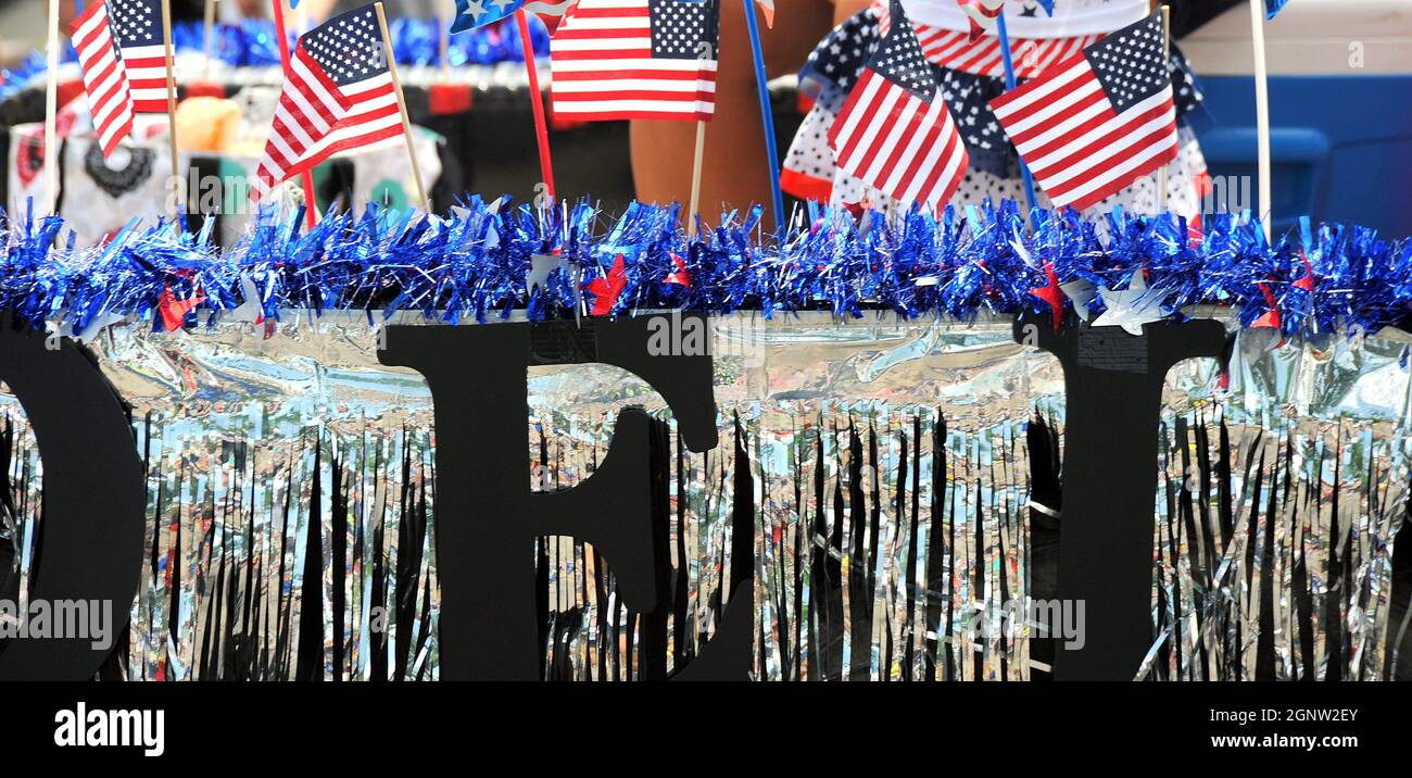 Decorative set-up with tinsel and American flags Stock Photo