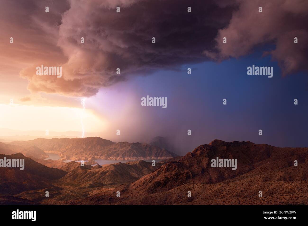 Lake Mead National Recreation Area with lightning storm and dramatic sky at sunset near Meadview, Arizona Stock Photo