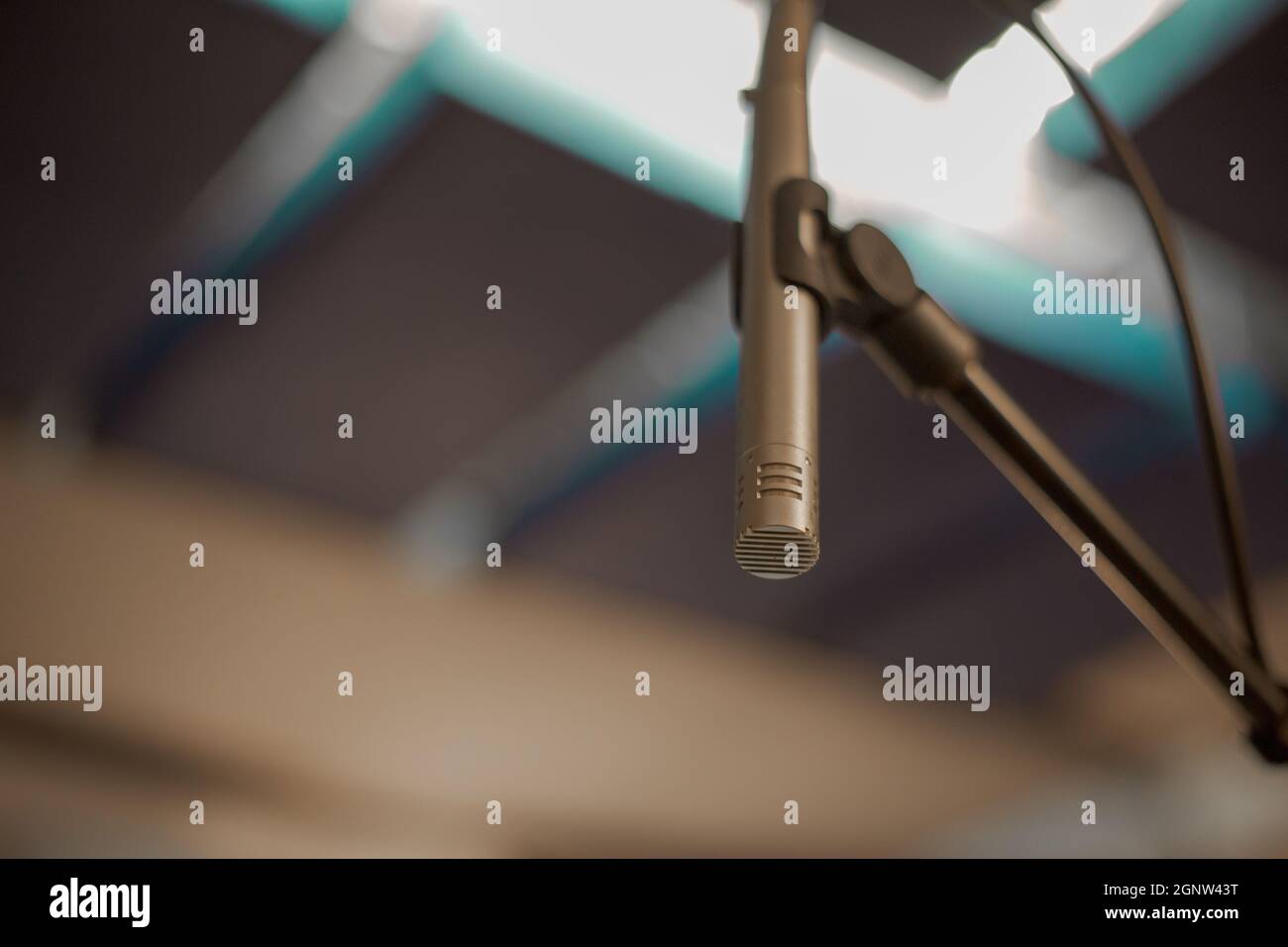 Small condenser overhead microphone with acoustic panels Stock Photo