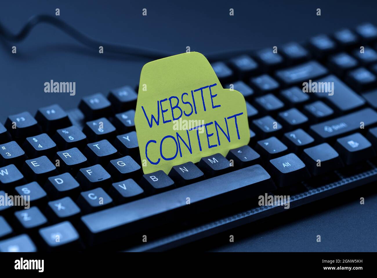 Writing displaying text Website Content. Conceptual photo single most important and soughtafter commodity on the web Abstract Typing Lesson And Stock Photo