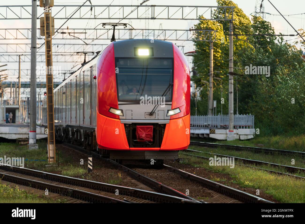 Front view of modern intercity high speed train on railway platform on
