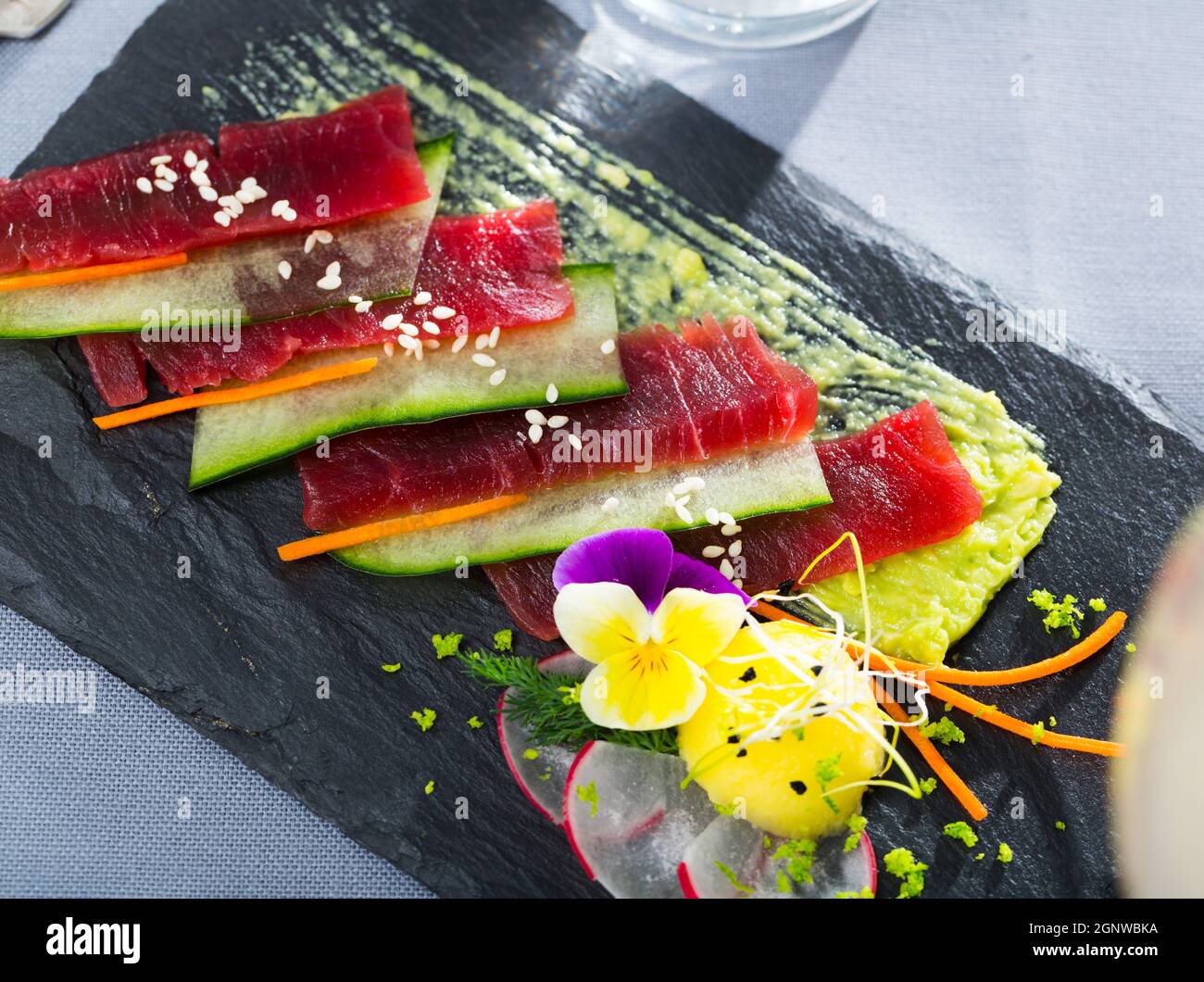 Tuna carpaccio with avocado sauce Stock Photo Alamy
