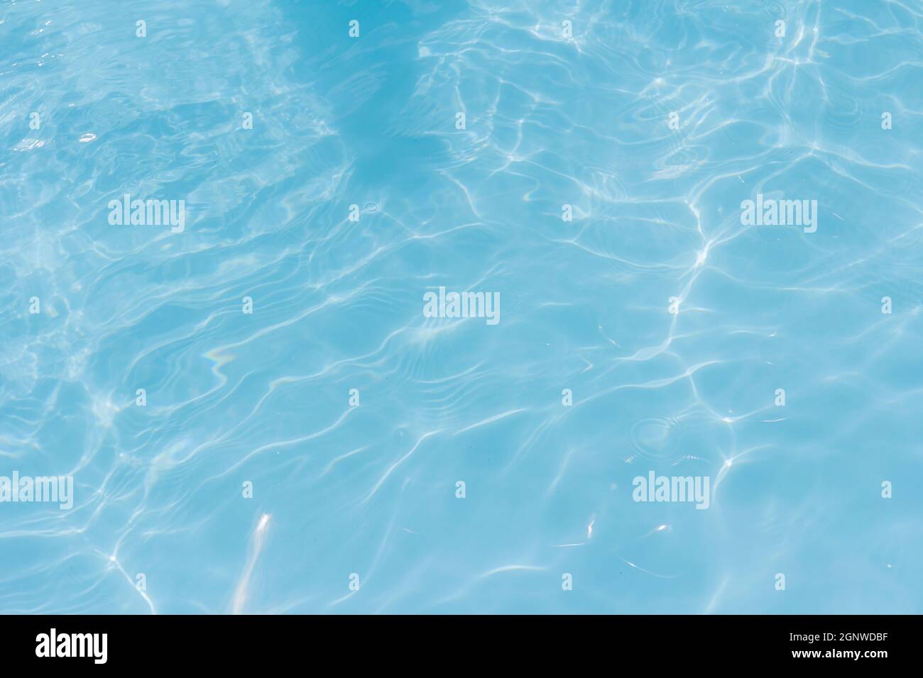 Blue pool water texture reflection background Stock Photo - Alamy