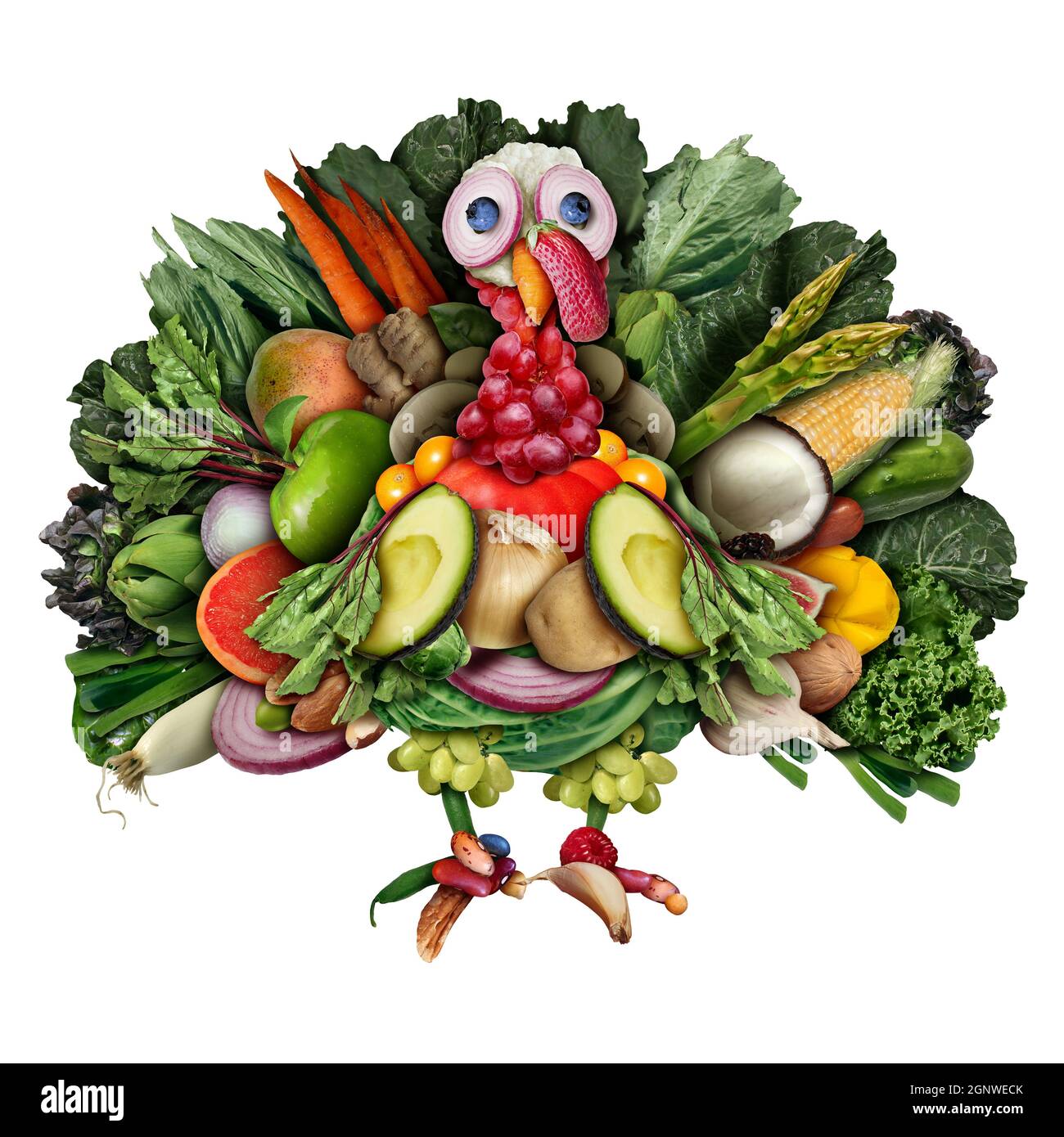 Vegan turkey and funny vegetarian thanksgiving harvest symbol as vegetables fruit nuts and berries shaped as a festive gobbler for a holiday. Stock Photo