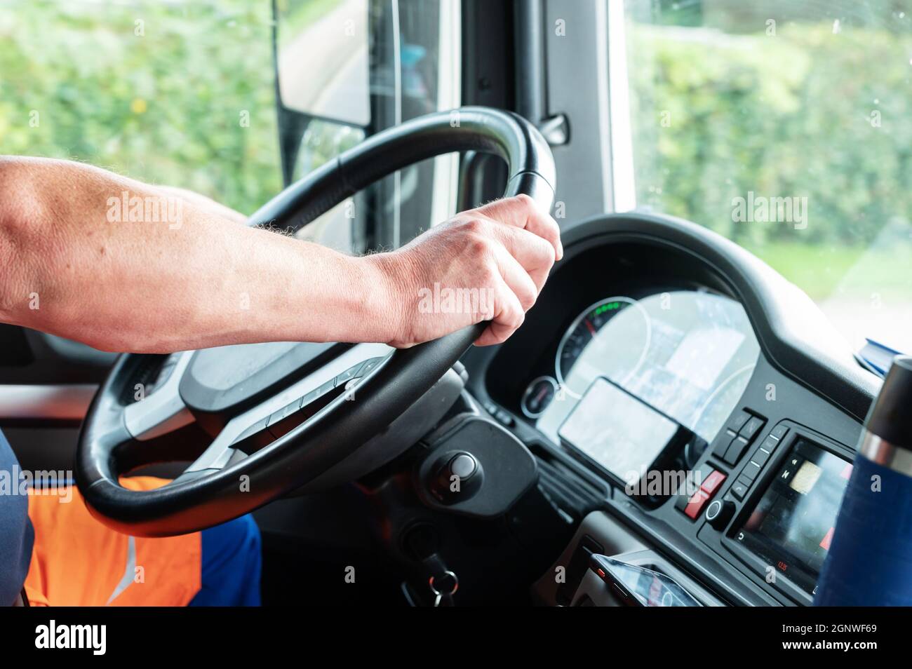 The workplace of a truck driver , behind the wheel Stock Photo