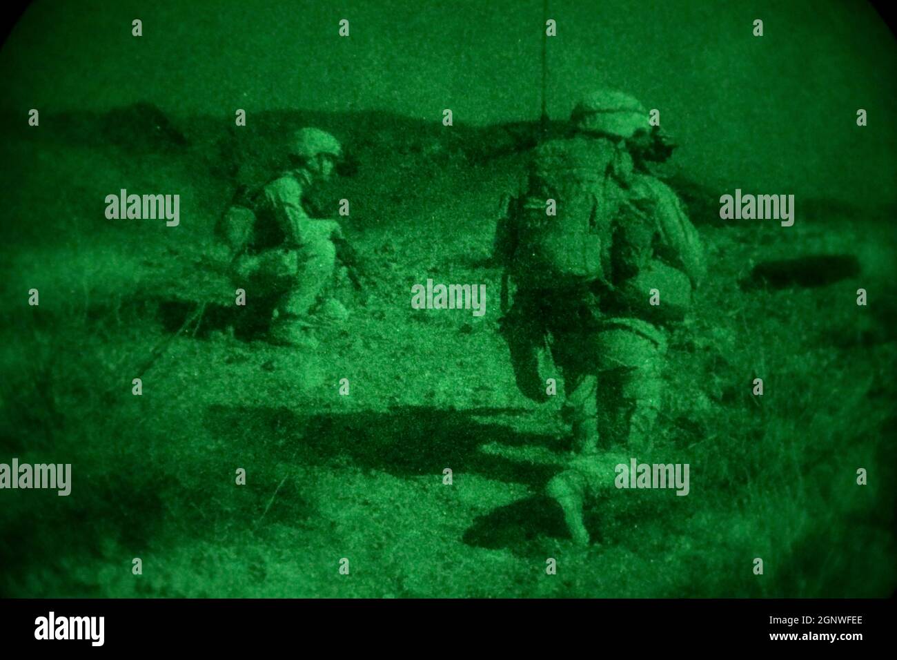 U.S. Marines with Co. I, 3rd Battalion, 7th Marine Regiment, 1st Marine Division, conduct a patrol during a company live-fire attack at Marine Corps Air Ground Combat Center Twentynine Palms, California, Sept. 18, 2021. The company-level attacks allow Marines to enhance their combat readiness and test their capabilities in a dynamic training scenario. (U.S. Marine Corps photo by Lance Cpl. Quince Bisard) Stock Photo