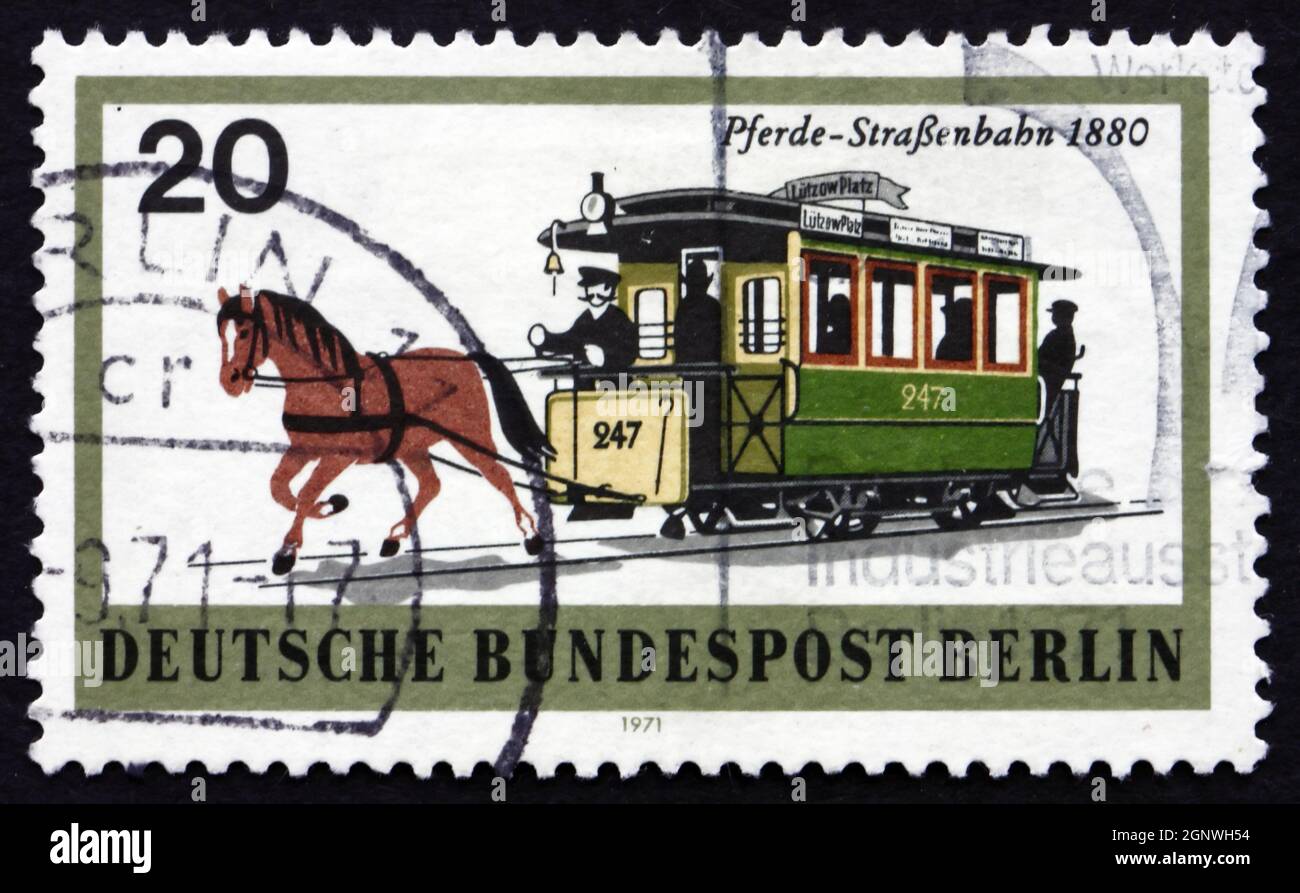 GERMANY - CIRCA 1971: a stamp printed in the Germany, Berlin shows Horsedrawn Trolley, circa 1971 Stock Photo