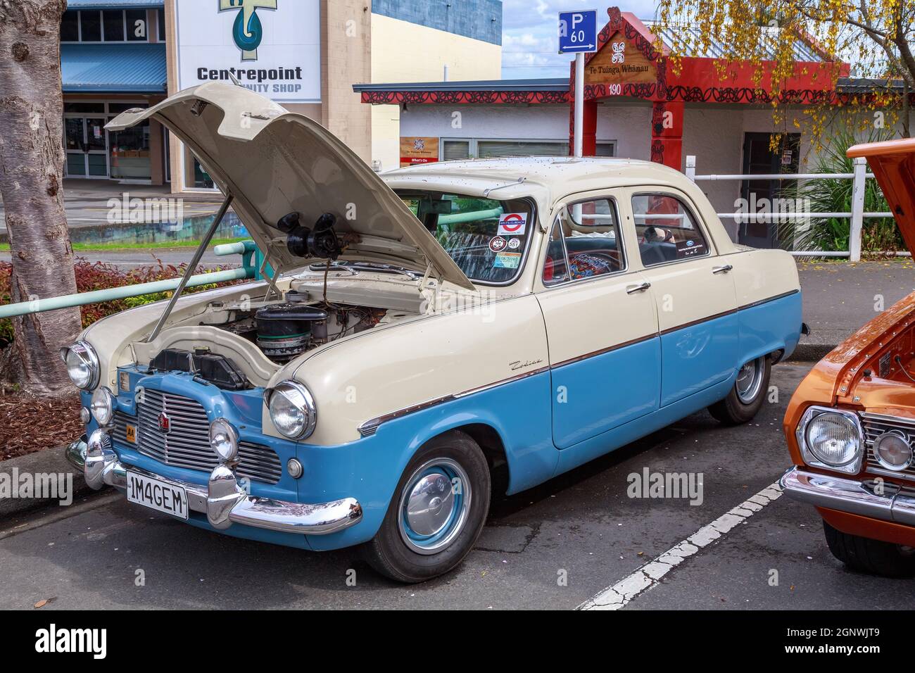 A two-tone 1955 Ford Zephyr Zodiac on display at a classic car show Stock Photo