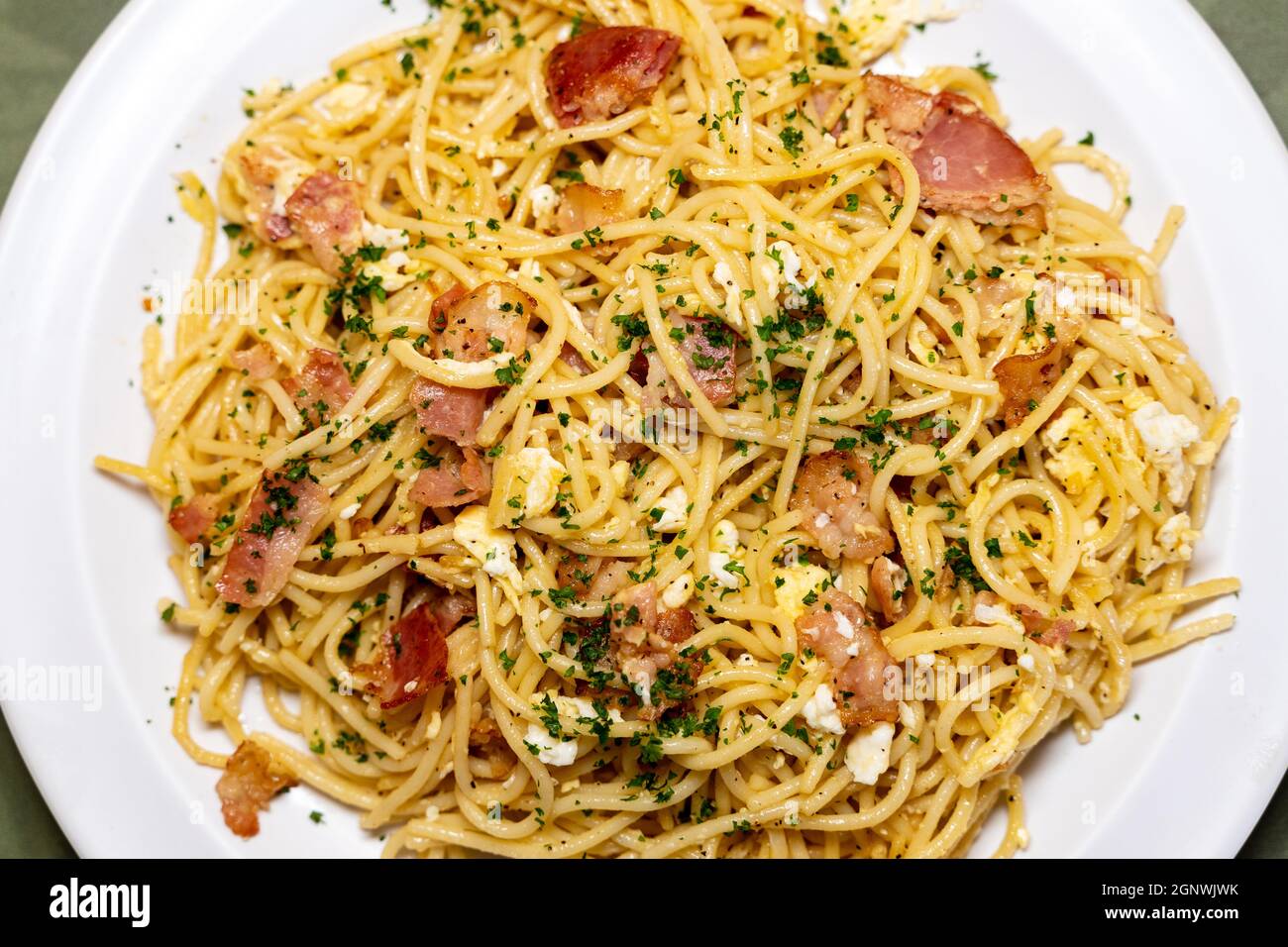 Traditional Dish Of Spaghetti Carbonara Served On A White Plate Stock Photo Alamy