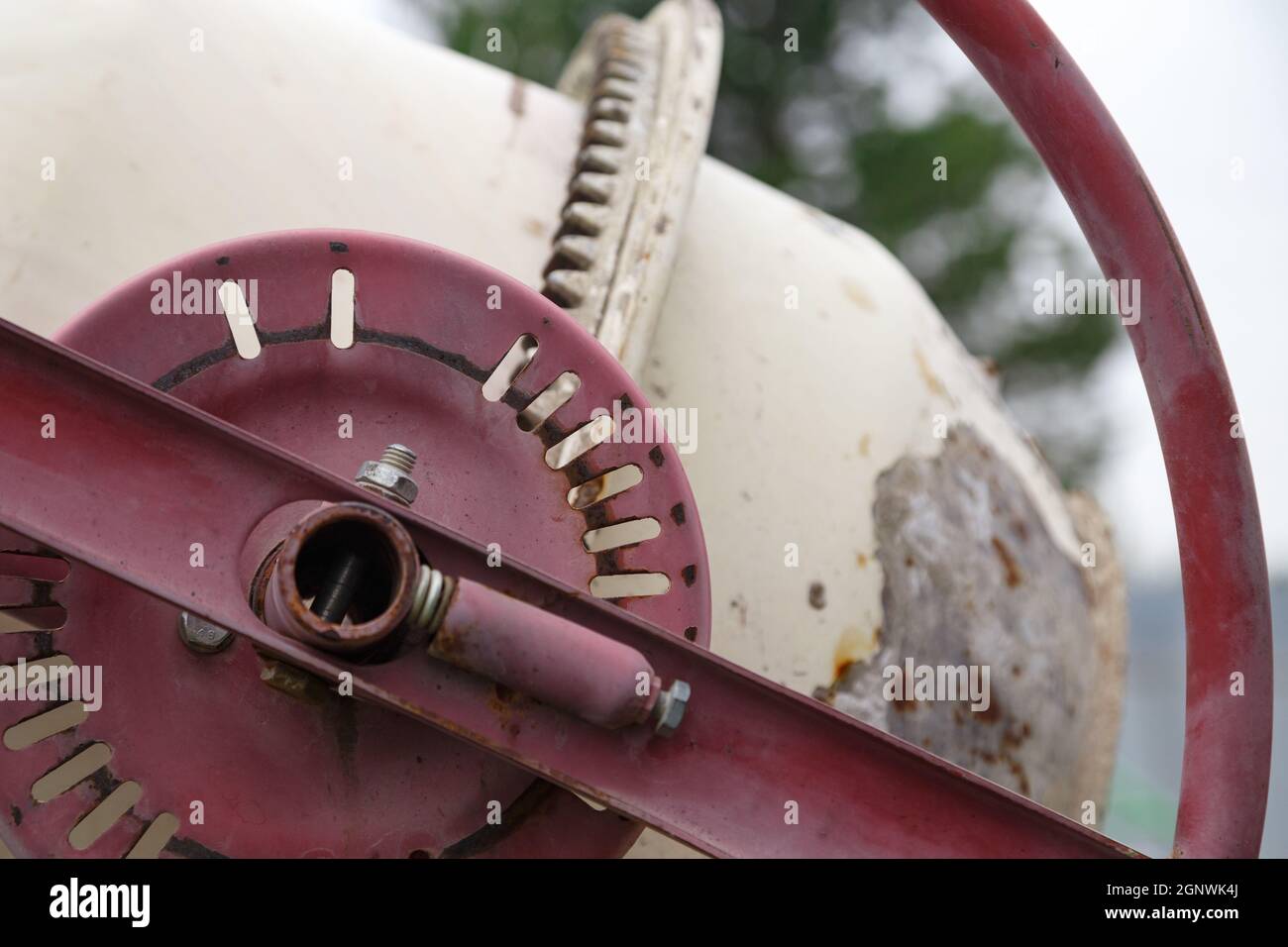 Photo of dirt old manual concrete mixer Stock Photo