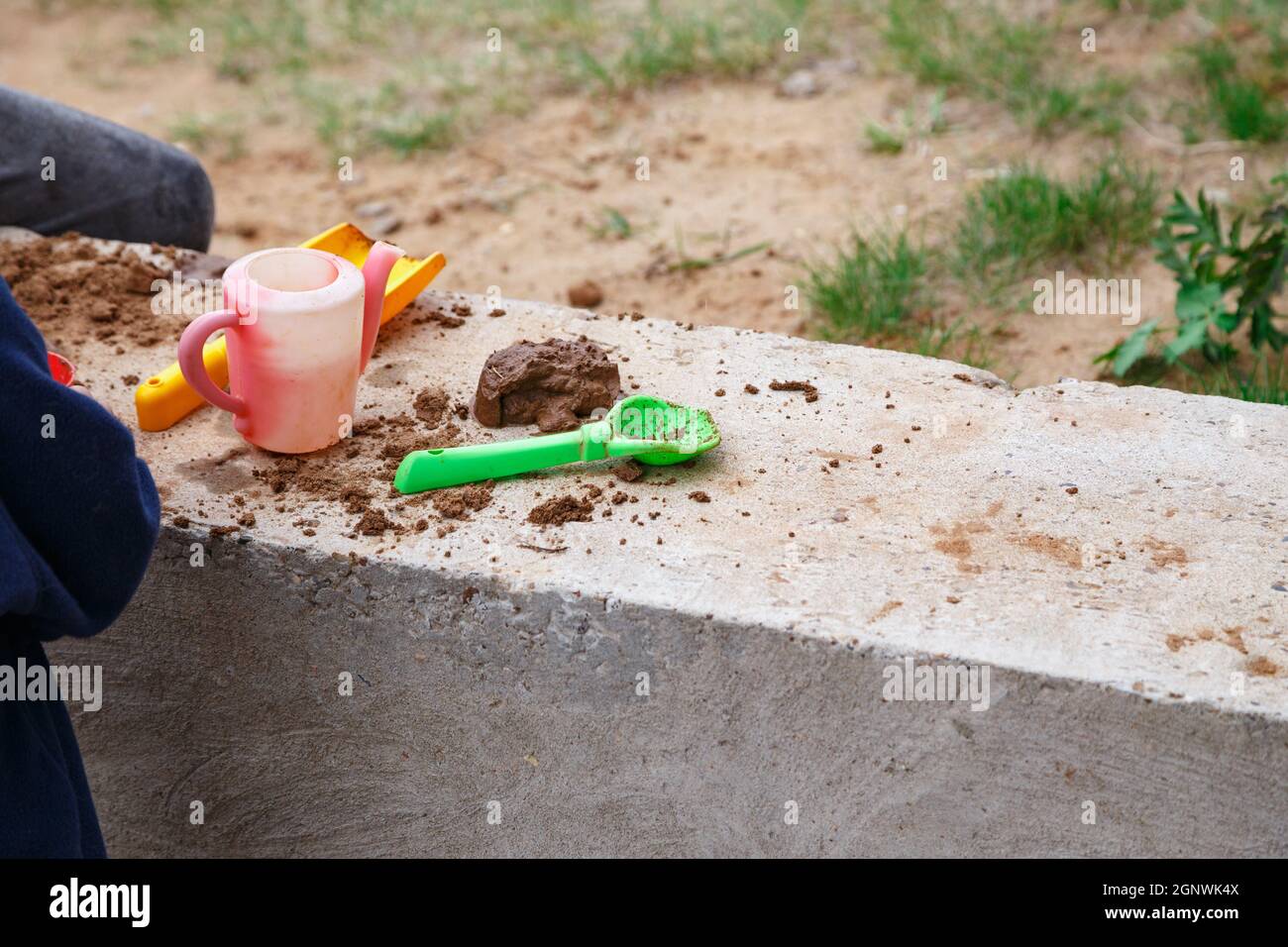 Photo of the kids toys for sand on playground in spring Stock Photo