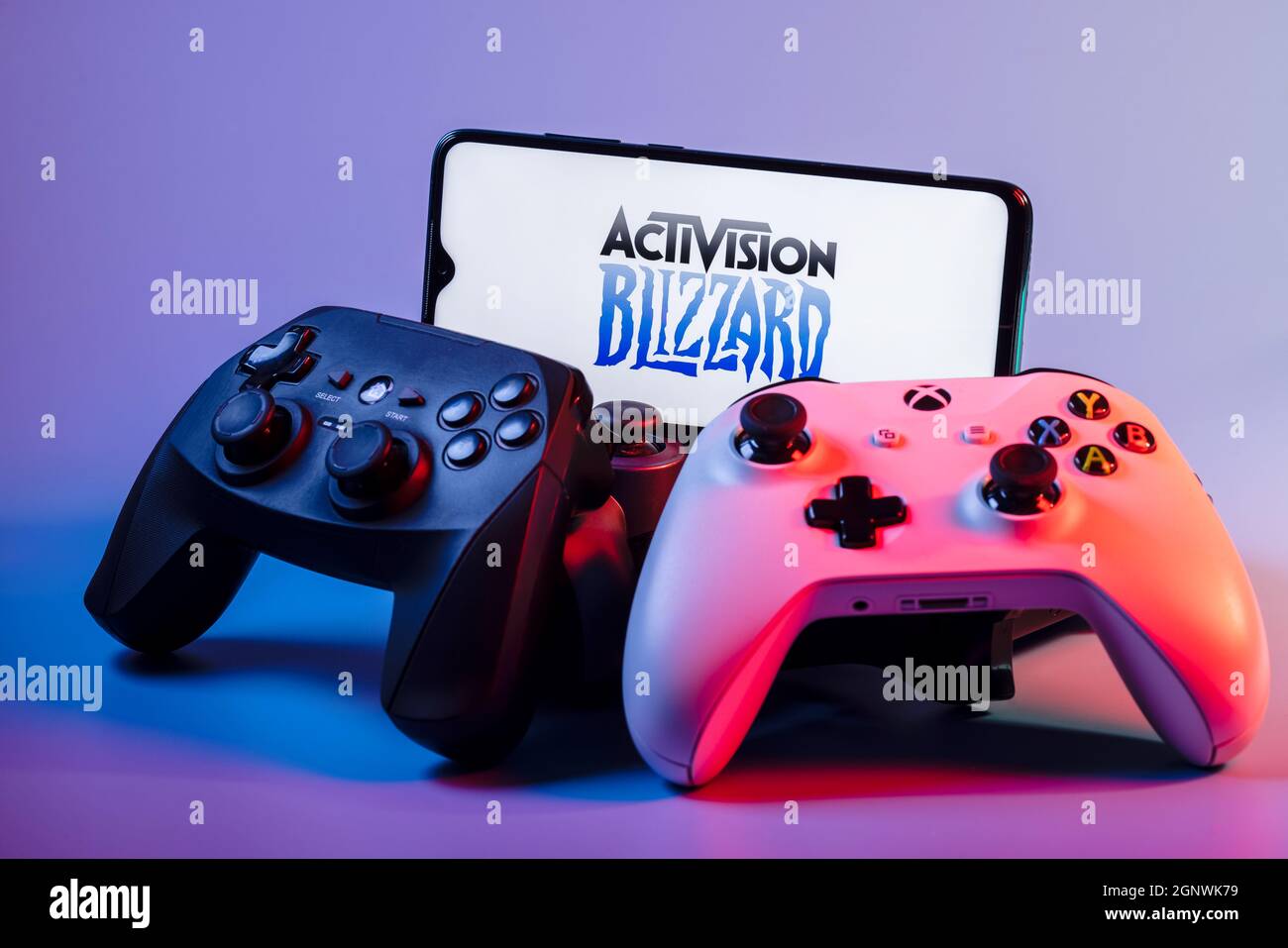 A smartphone with the Activision Blizzard logo on the screen on the ...