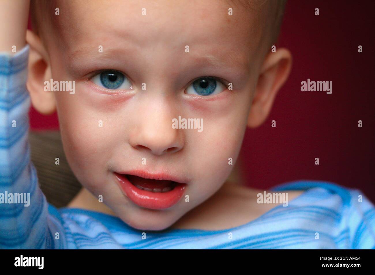 One year old baby boy stare straight to camera Stock Photo