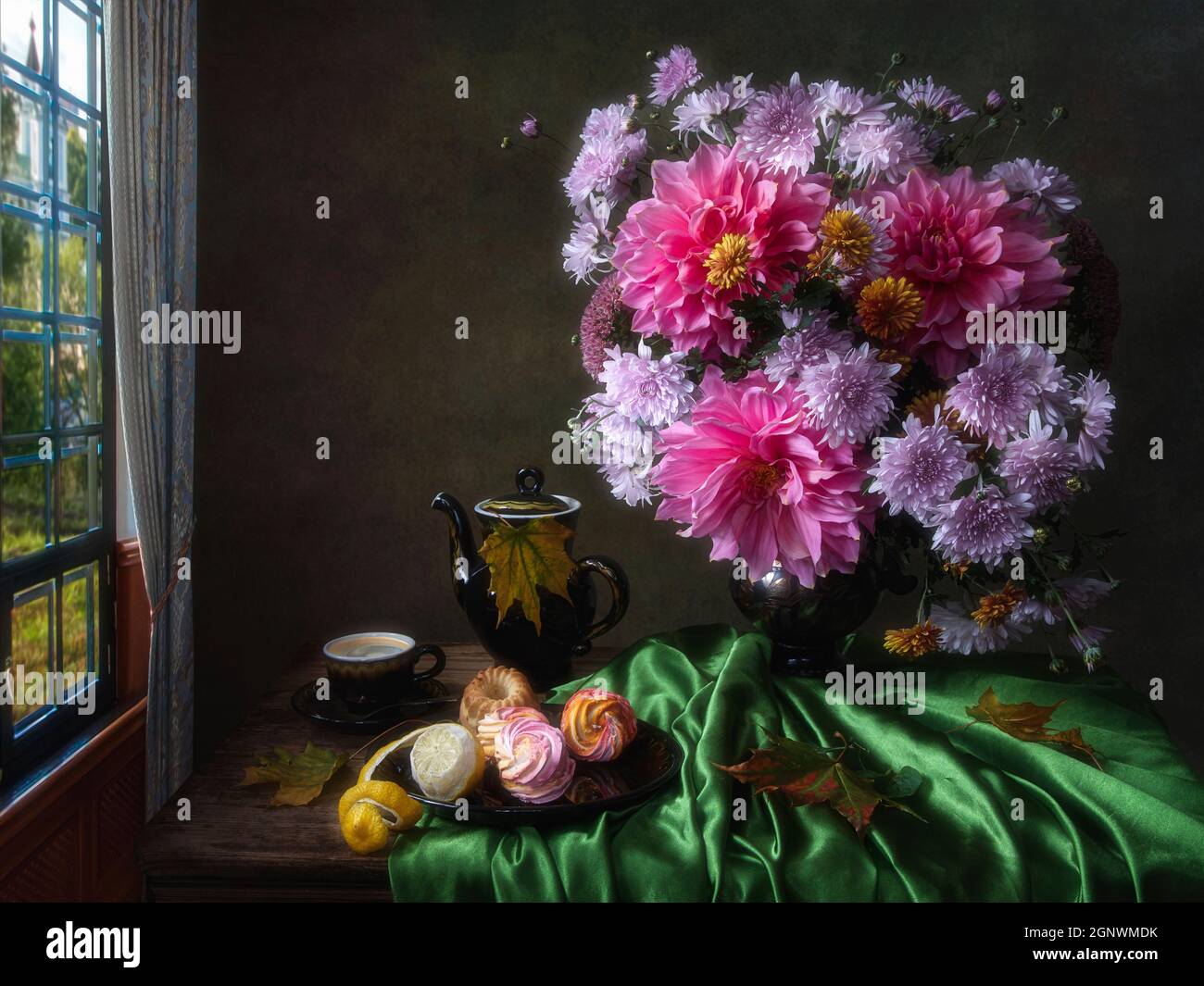Still life with bouquet of autumn flowers on coffee table Stock Photo ...