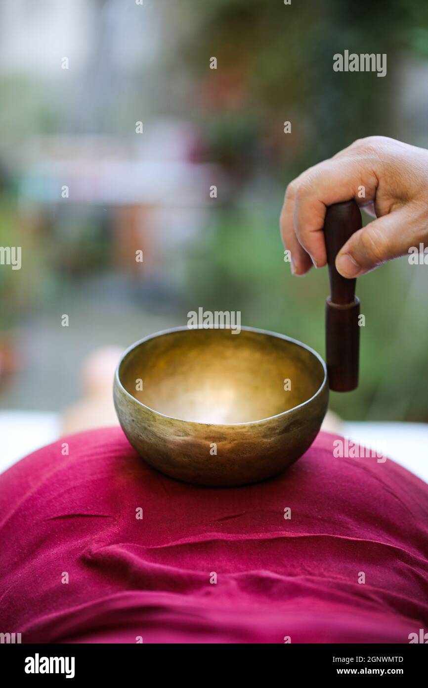 Tibetan singing bowls treatment Stock Photo Alamy